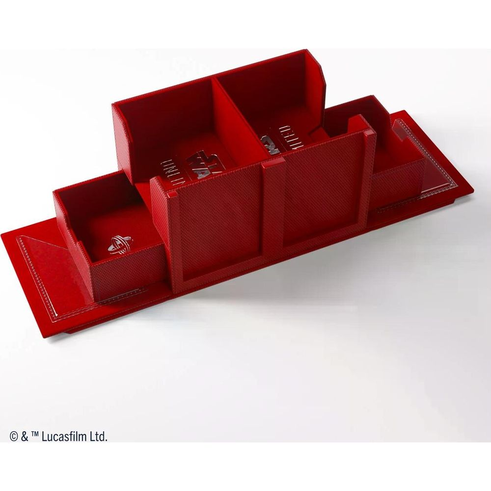 Roter Organizer mit Fächern, einer Schublade mit Ring und silbernen Klammern.