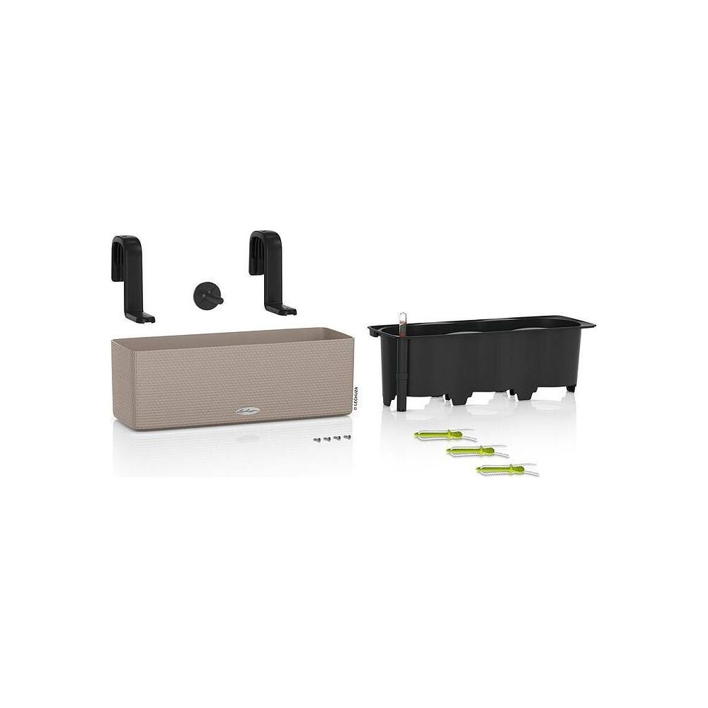 Une jardinière beige avec insert noir et supports.