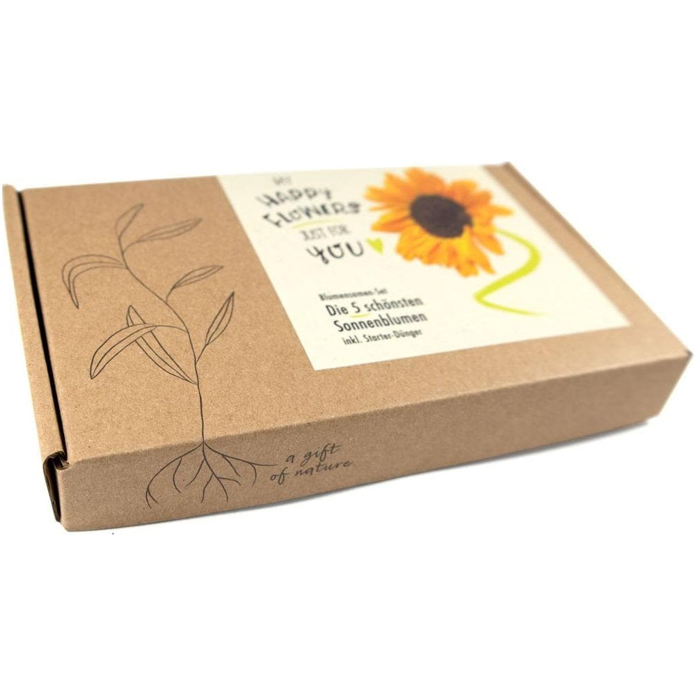 Una scatola di cartone per un set di semi di fiori con motivo girasole.