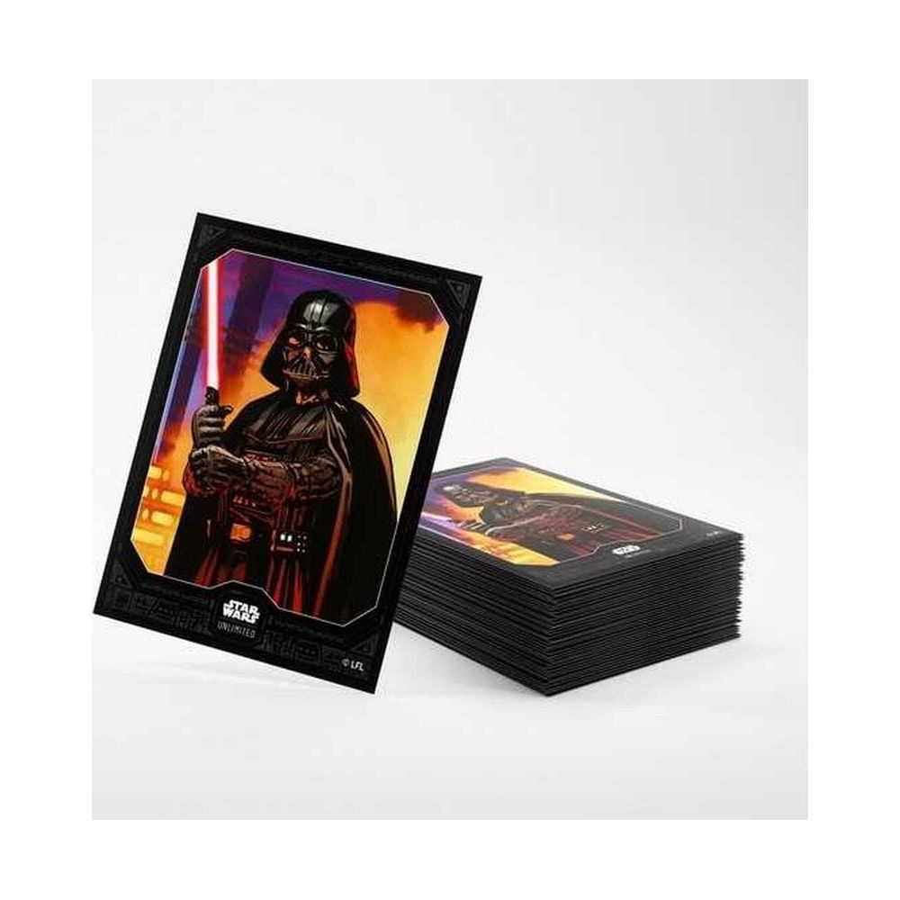 Dark Vador tient un sabre laser rouge. À côté, une pile de cartes.