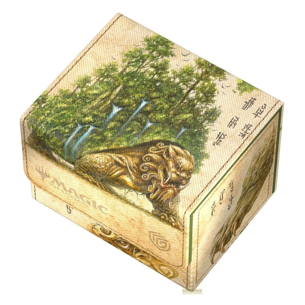Une boîte représentant un lion et des arbres, avec du texte japonais.