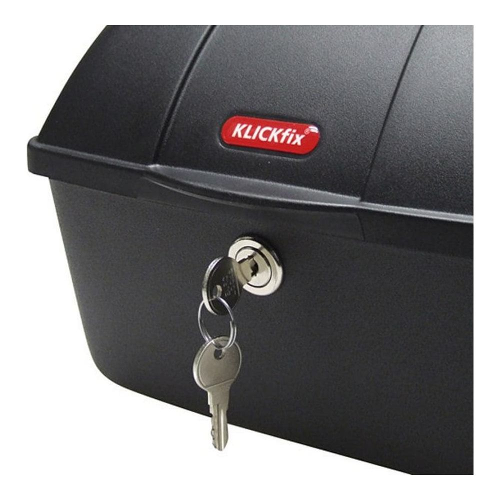 Schwarze Aufbewahrungsbox mit silbernem Schloss und Schlüsseln. Rotes KLICKfix-Logo oben.