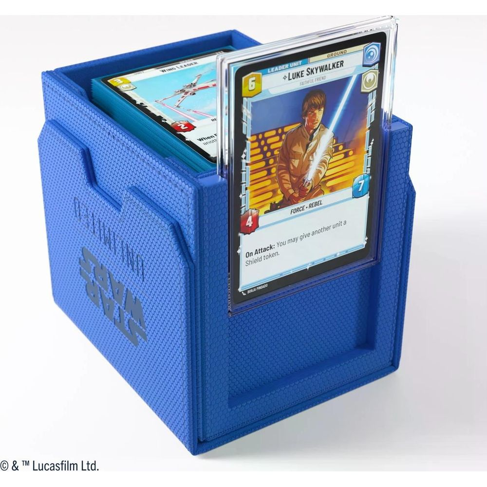 Un porte-cartes bleu Star Wars avec une carte de Luke Skywalker devant.