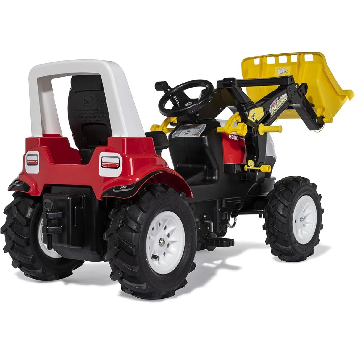 Roter Spielzeugtraktor mit Frontlader, schwarzem Sitz und weißem Dach.