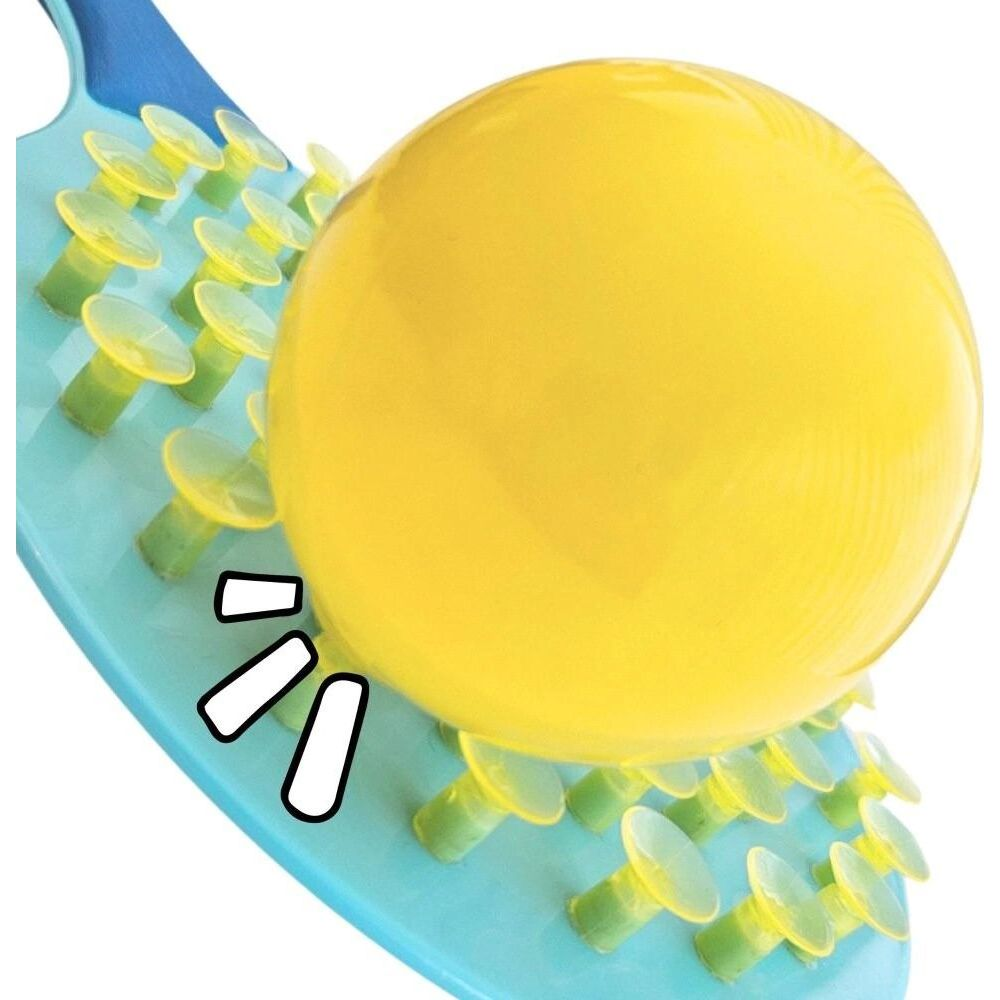 Una palla gialla poggia su una base blu con ventose.