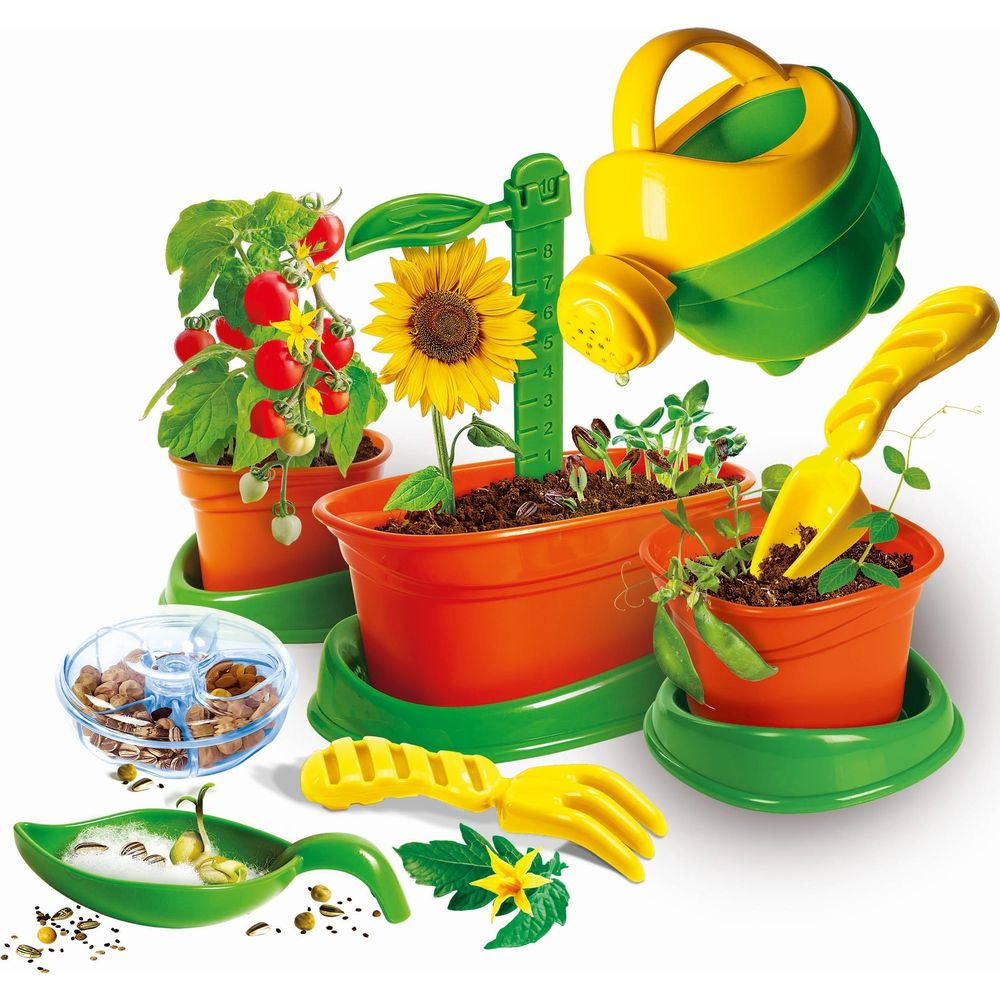 Gartenset mit Tomaten, Sonnenblume, Erbsen, Gießkanne, Schaufel und Samen.