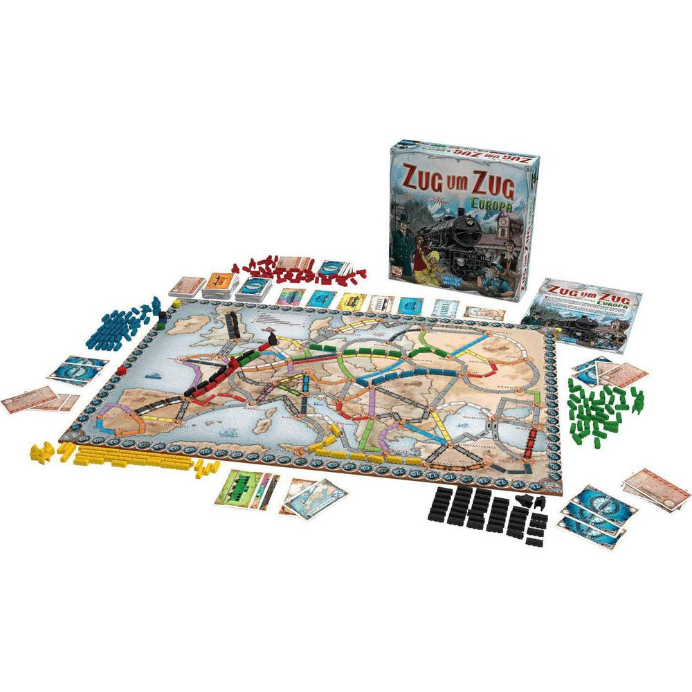 Gioco da tavolo con mappa dell'Europa, treni, carte e pedine.