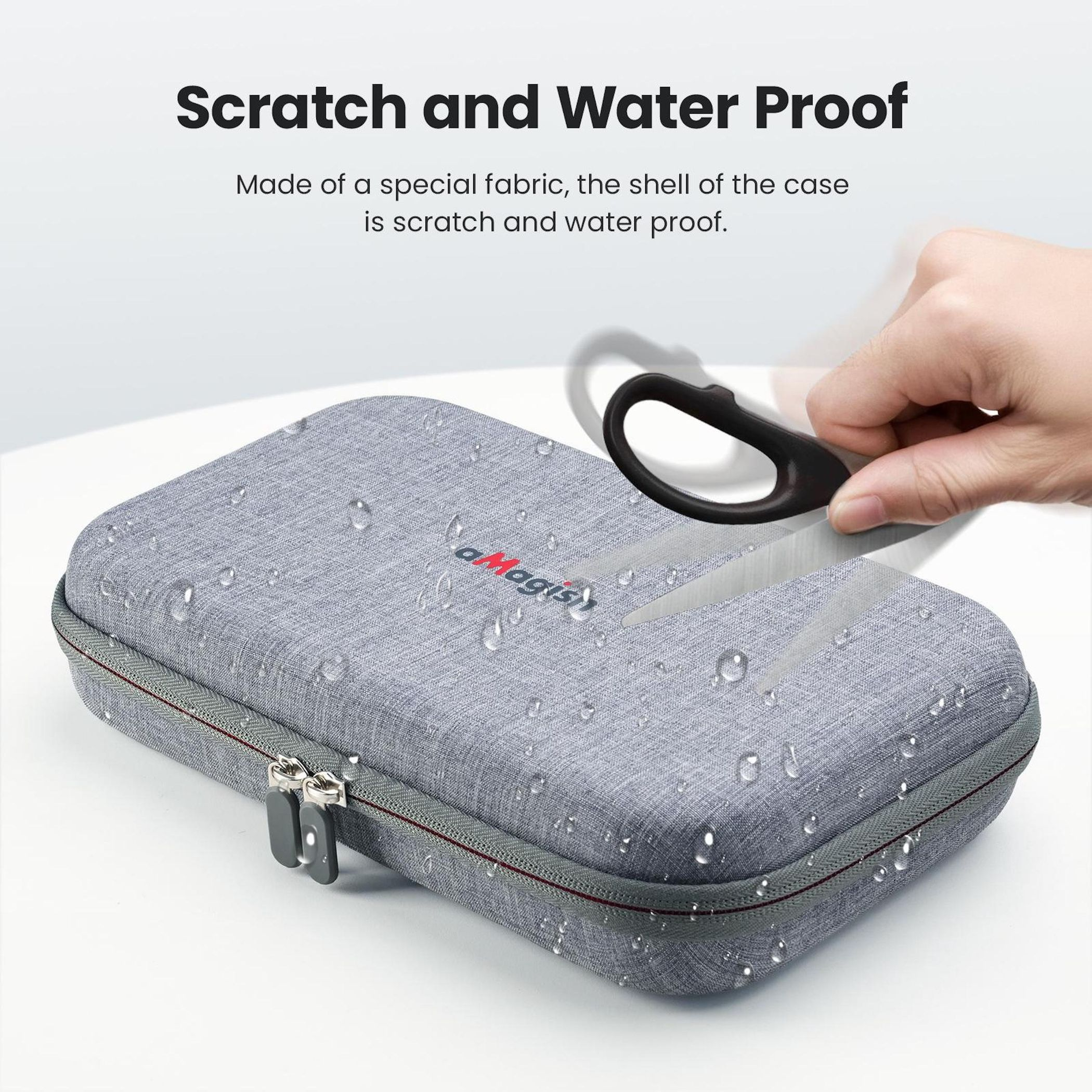 Grauer Koffer mit Wassertropfen und Schere, die ihn zerschneidet.