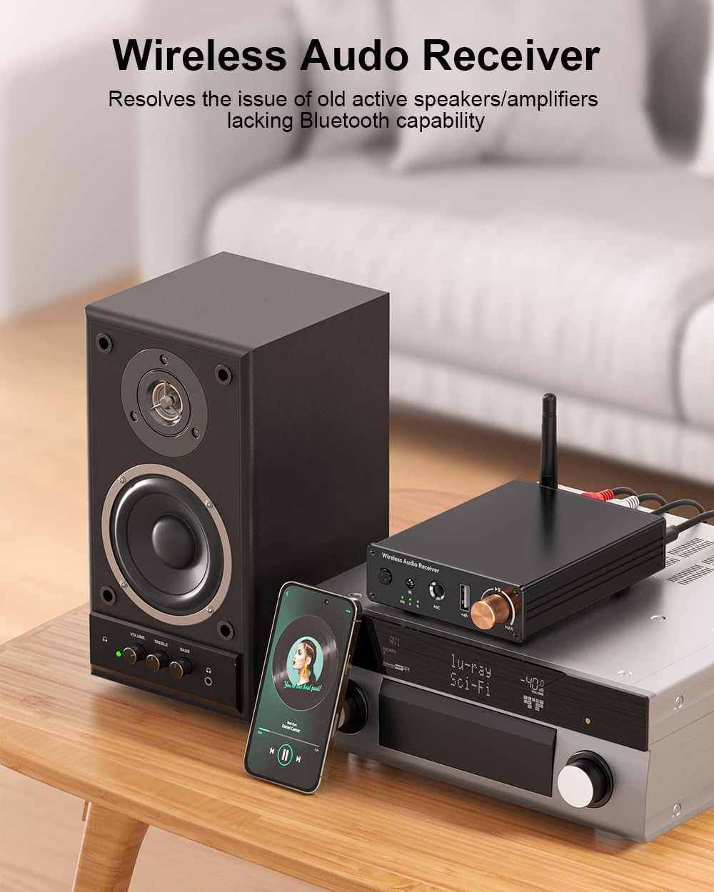 Ein schwarzer Lautsprecher, ein Smartphone und ein Wireless Audio Receiver auf einem Holztisch.