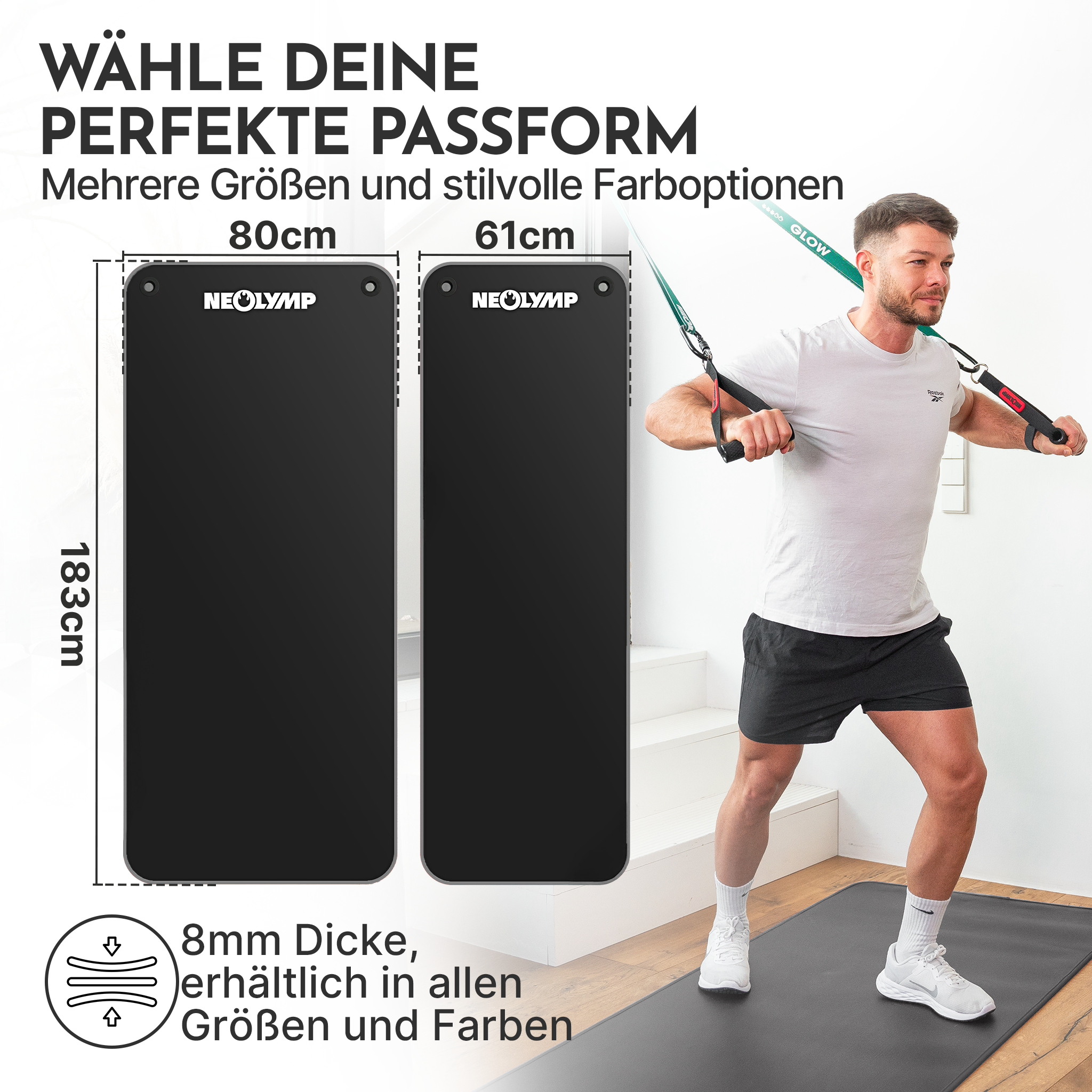 Mann trainiert mit Schlingentrainer neben zwei schwarzen Neolymp Matten in 80cm und 61cm.