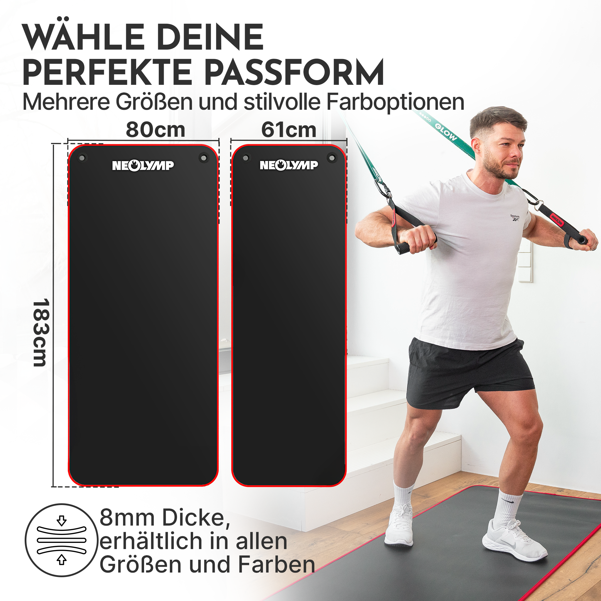Mann trainiert mit TRX-Bändern vor zwei schwarzen Matten (80cm und 61cm).
