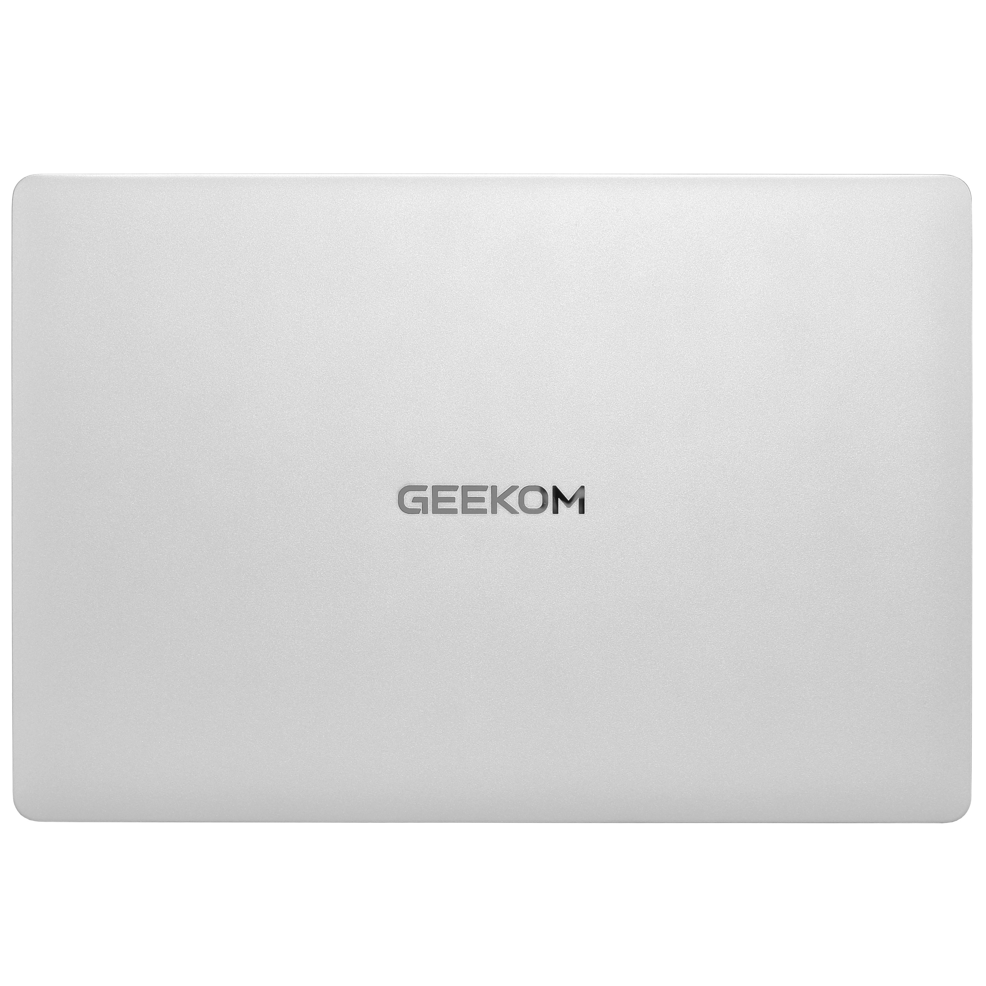 Geschlossener silberner Laptop mit GEEKOM-Logo auf der Oberseite.