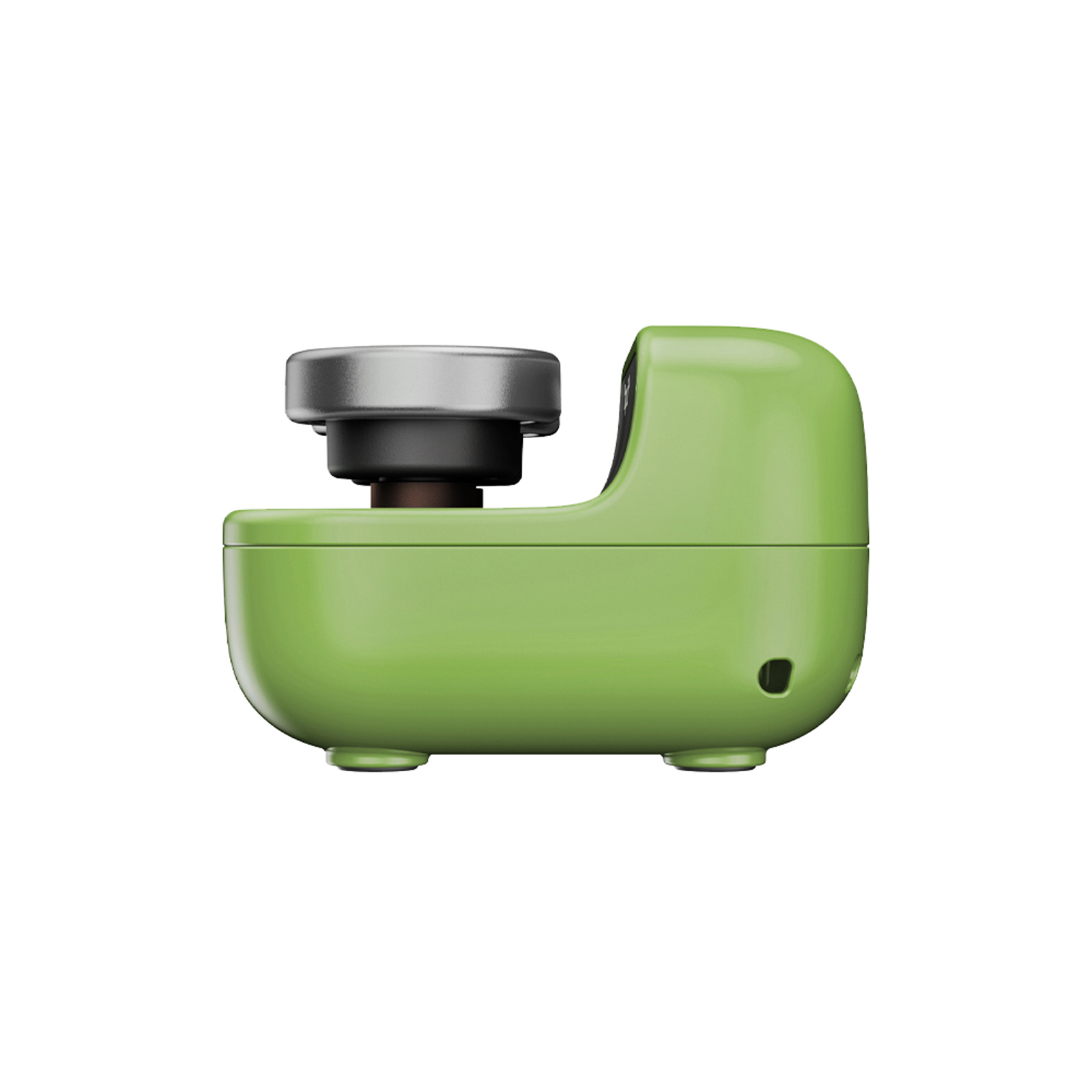Dispositivo verde con manopola argentata e base nera su sfondo bianco.