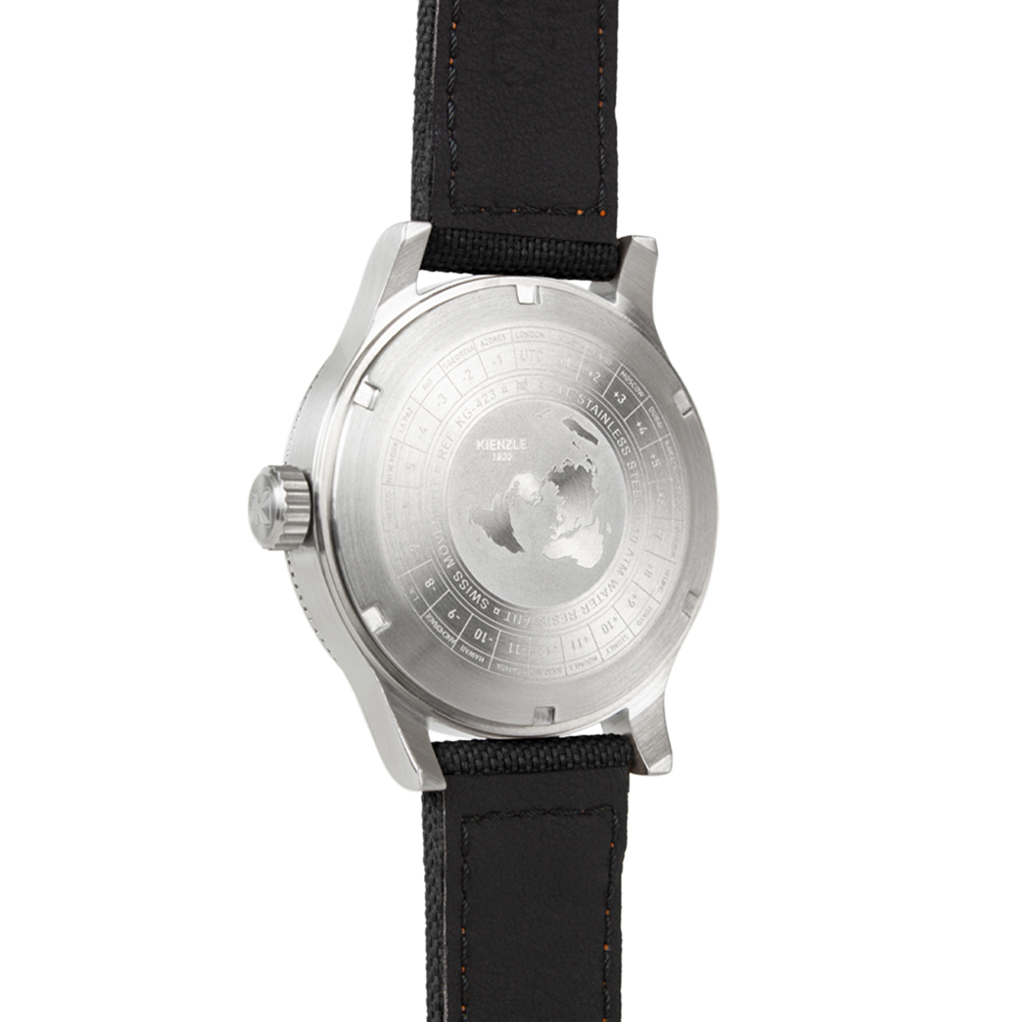 Rückseite einer Kienzle-Uhr mit Weltzeitanzeige und schwarzem Stoffarmband.