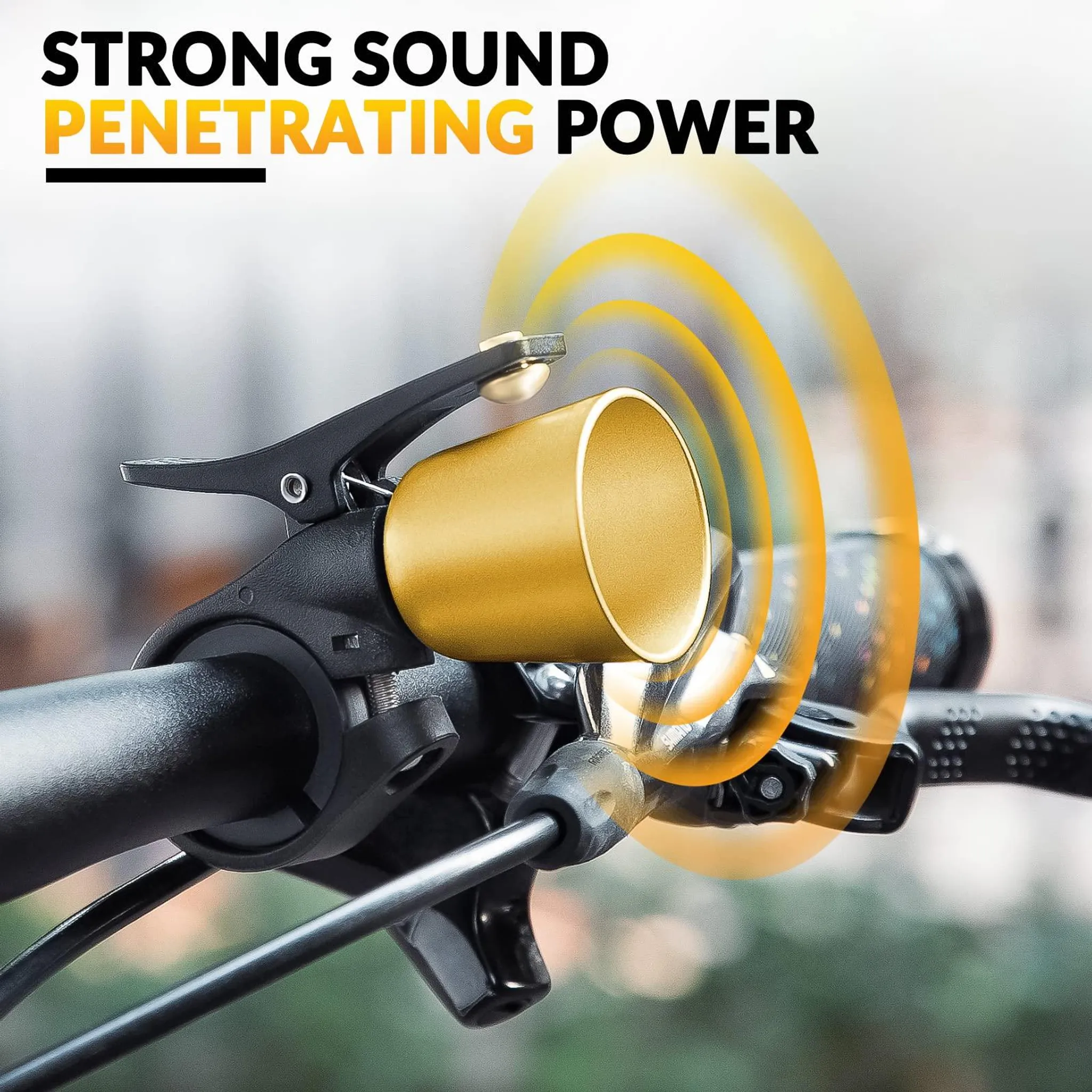 Goldene Fahrradklingel am Lenker mit Klangwellen-Effekt.