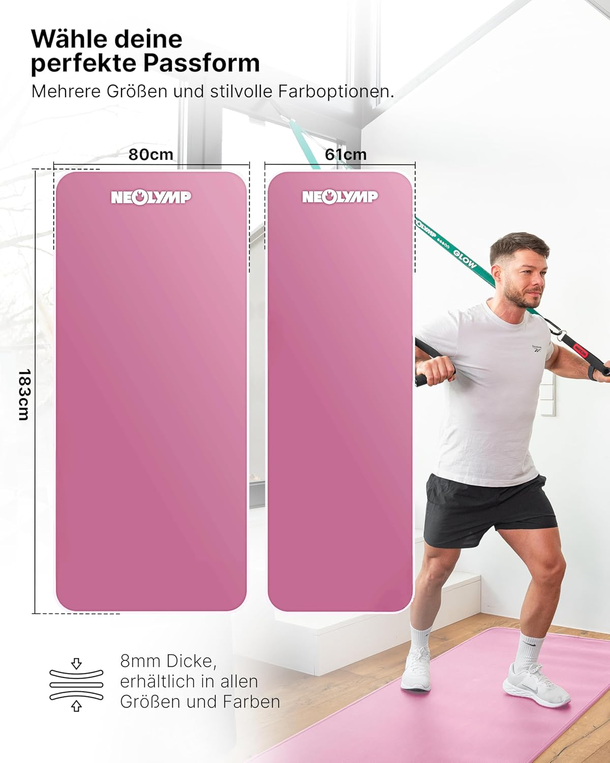 Zwei pinke Yogamatten, eine 80cm und eine 61cm breit. Ein Mann trainiert im Hintergrund.