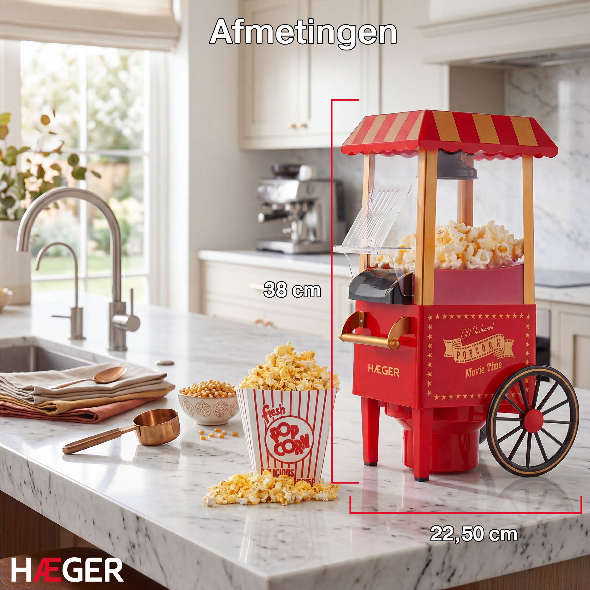 Red popcorn machine with red and gold striped roof, filled with popcorn.