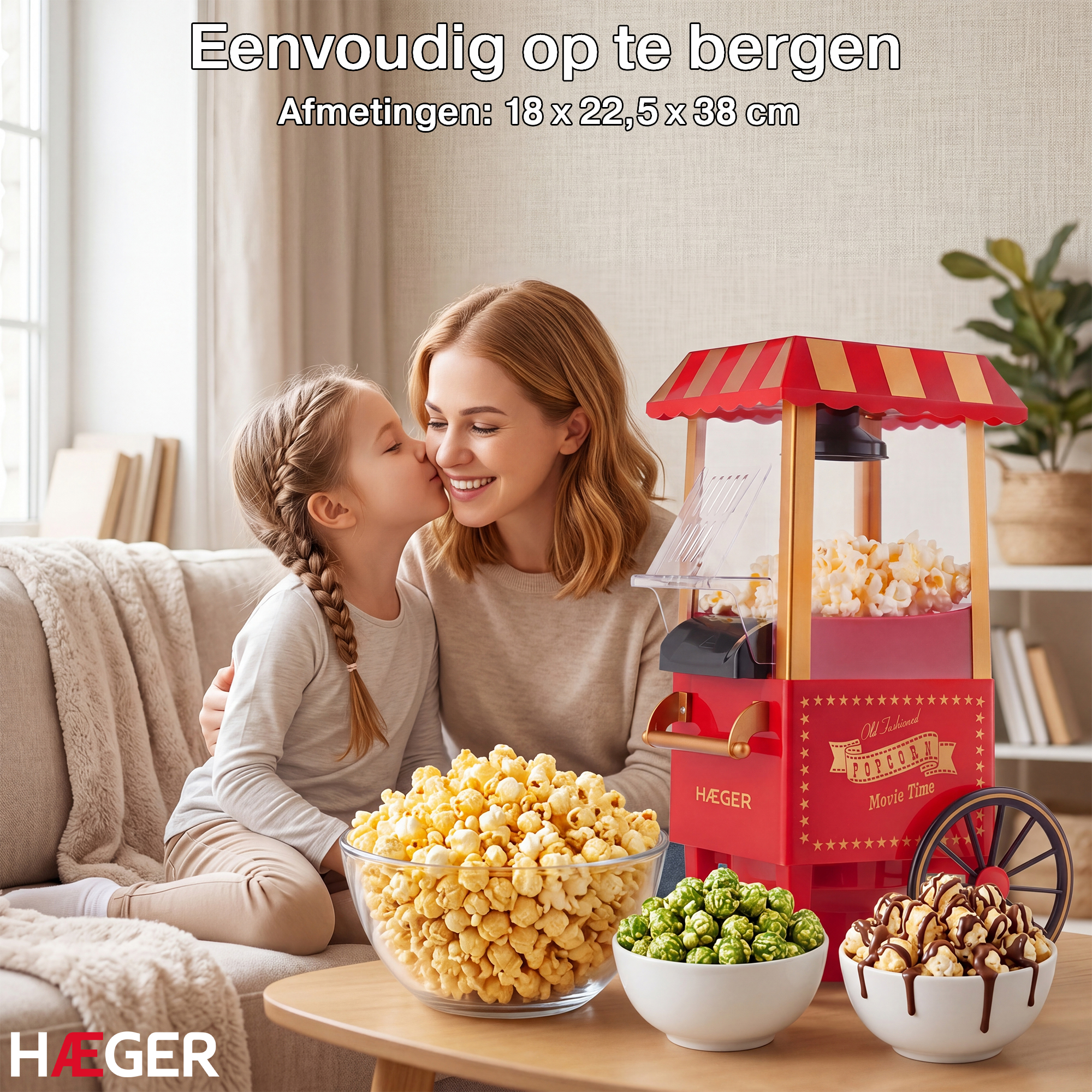 Mother and child kiss next to a red popcorn machine with multiple bowls of popcorn.