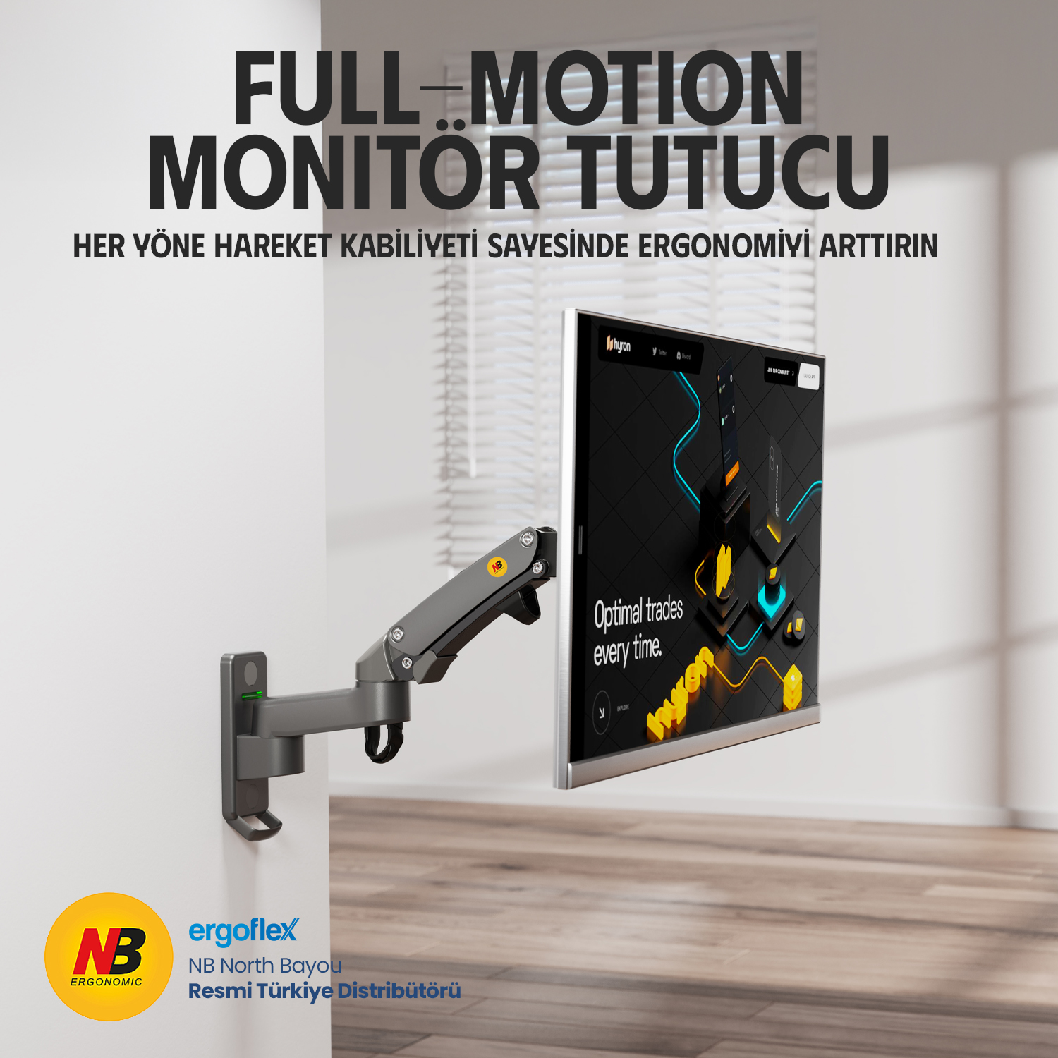 Duvara monte edilmiş gri monitör kolu, web sitesi gösteren ekranlı.