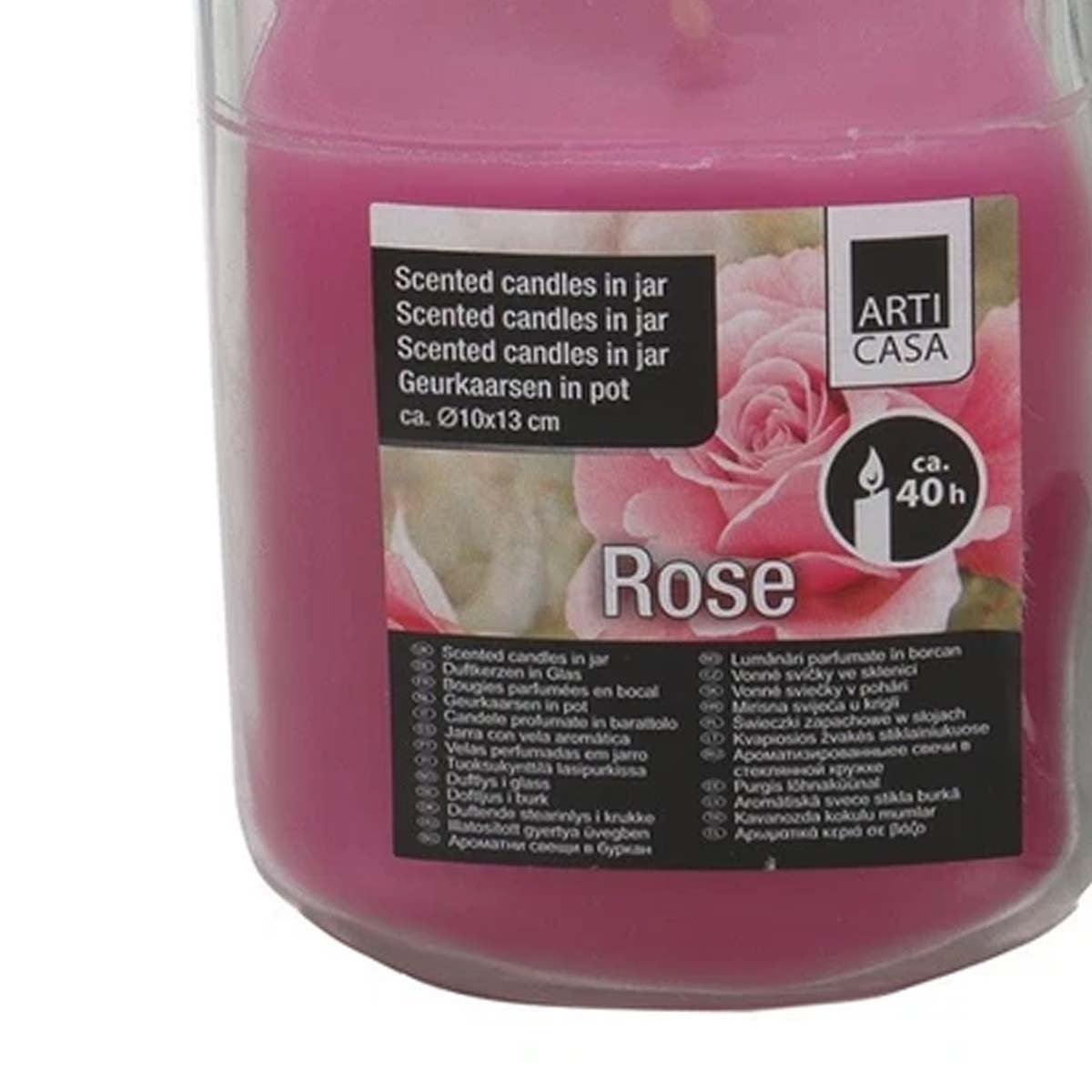 Un vaso di vetro con candela profumata alla rosa, marca Arti Casa, brucia per circa 40 ore.