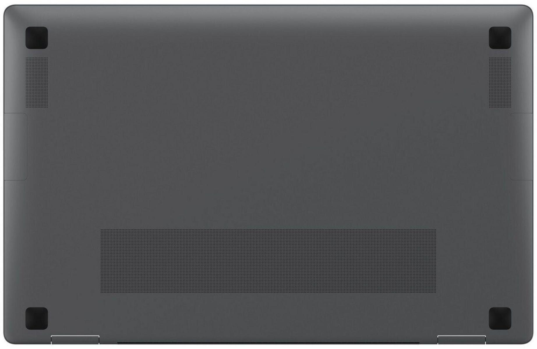 Spód ciemnego laptopa z otworami wentylacyjnymi i gumowymi nóżkami.