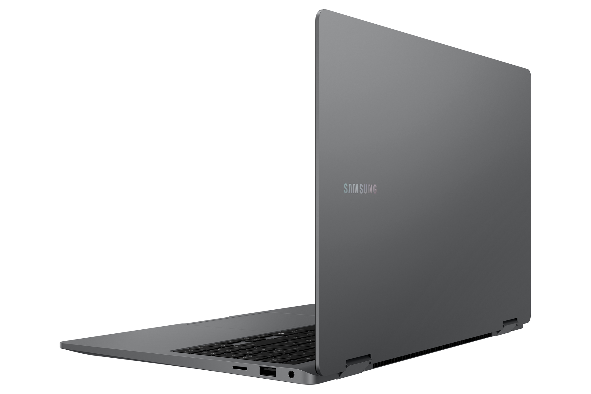 Szary laptop Samsung jest otwarty, widać klawiaturę i część ekranu.