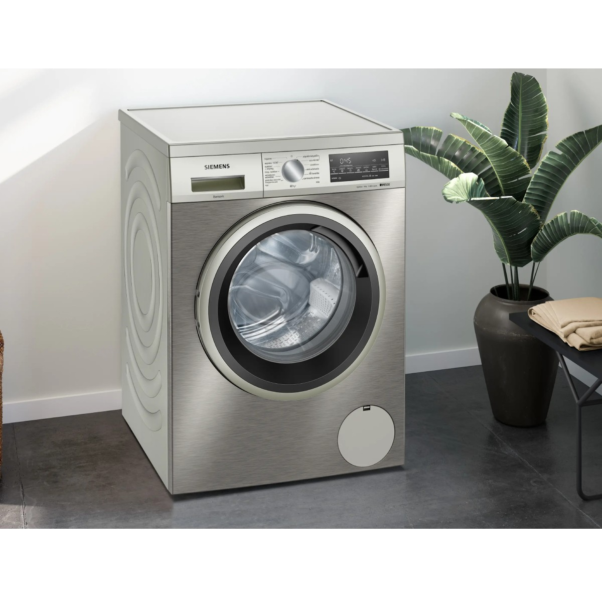 Moderne Siemens Waschmaschine aus Edelstahl mit großem Bullauge und Display.