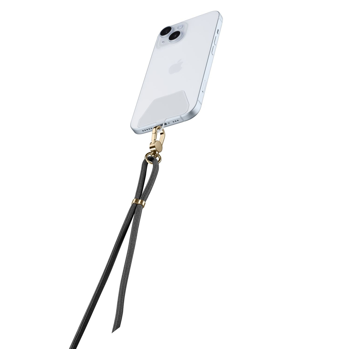 Uno smartphone trasparente con un laccetto scuro attaccato alla porta di ricarica.