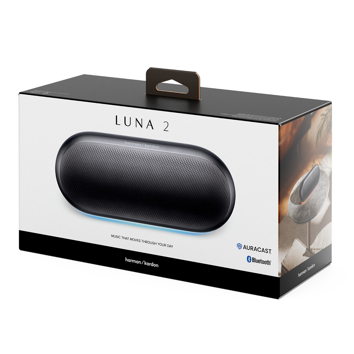 Schwarzer Harman Kardon LUNA 2 Lautsprecher auf Verpackung mit blauer Beleuchtung.