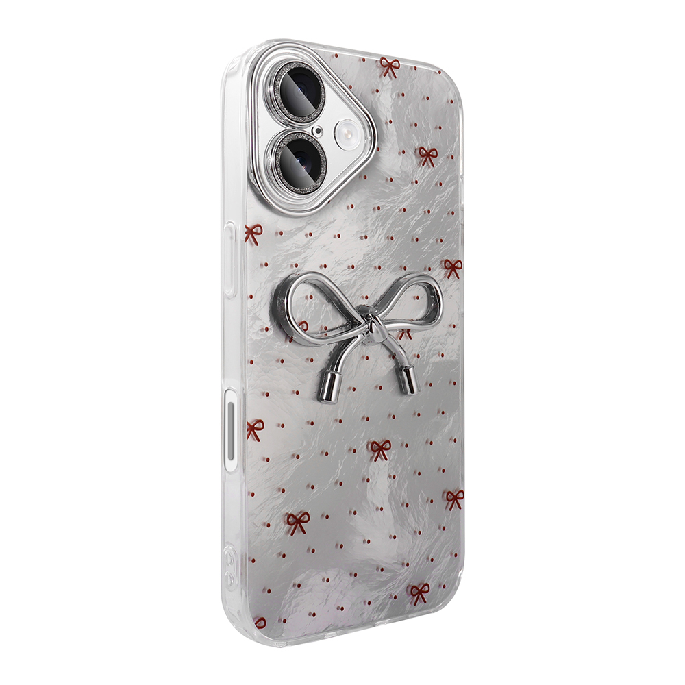 Kırmızı fiyonklar ve noktalarla süslenmiş gümüş telefon kılıfı, büyük fiyonk detayı.