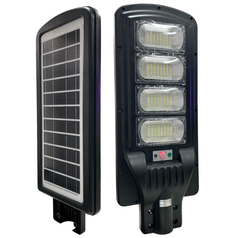 Dört LED'li ve güneş panelli siyah solar lamba, beyaz üzerinde izole.