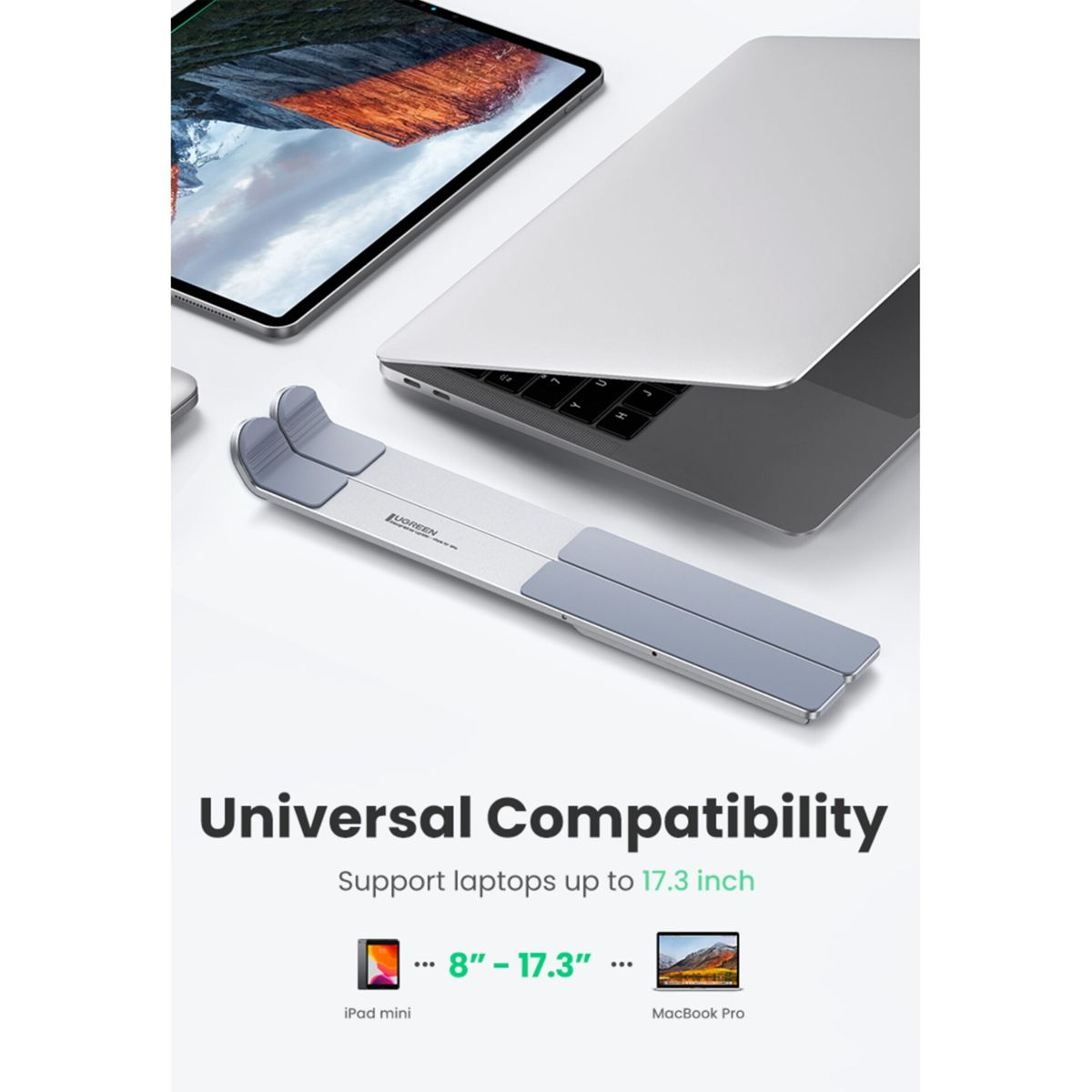 Ein tragbarer Laptop-Ständer aus Metall und Gummi mit einem Laptop und Tablet.