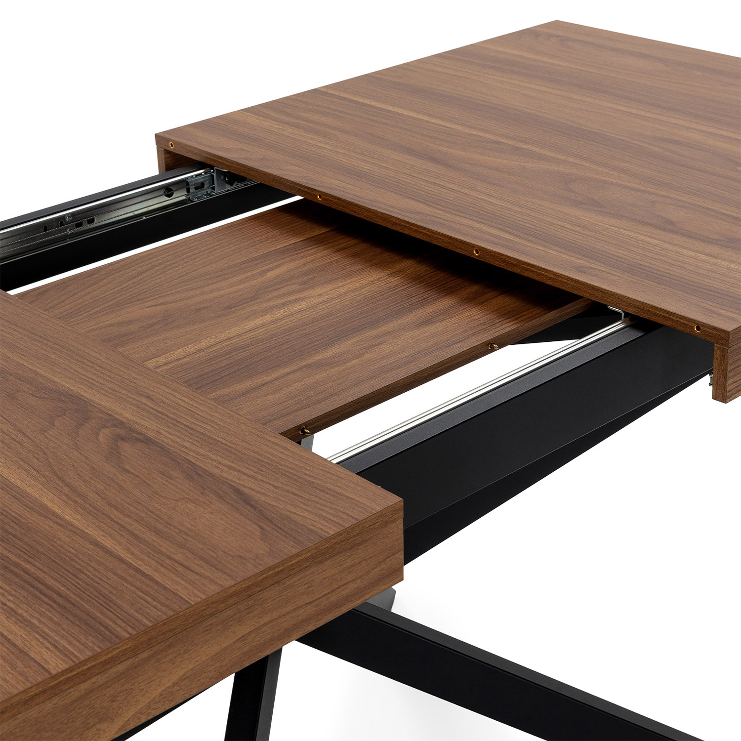 Mesa extensible de madera con patas metálicas negras y mecanismos deslizantes.