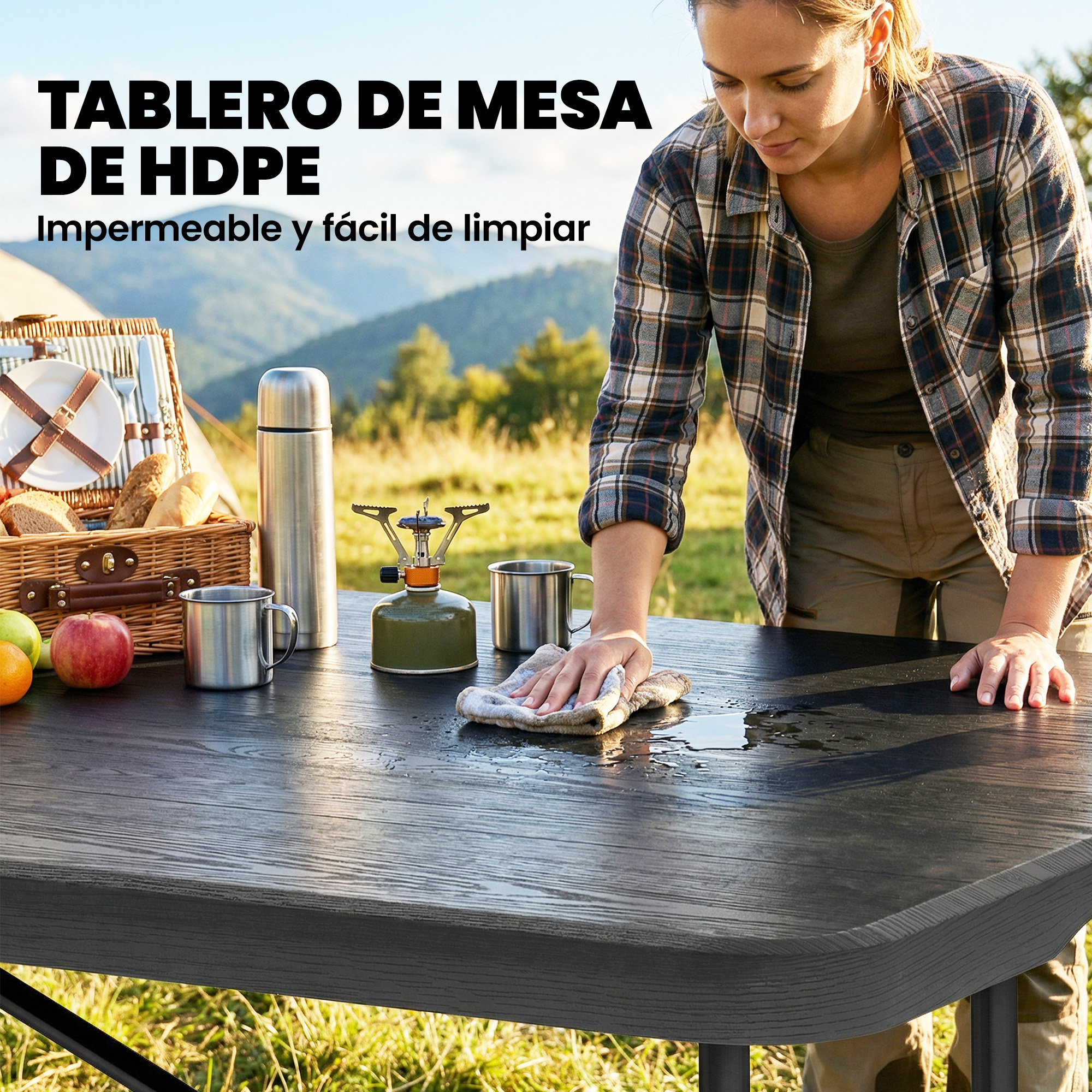 Mujer limpiando mesa HDPE al aire libre con cesta de picnic y hornillo.
