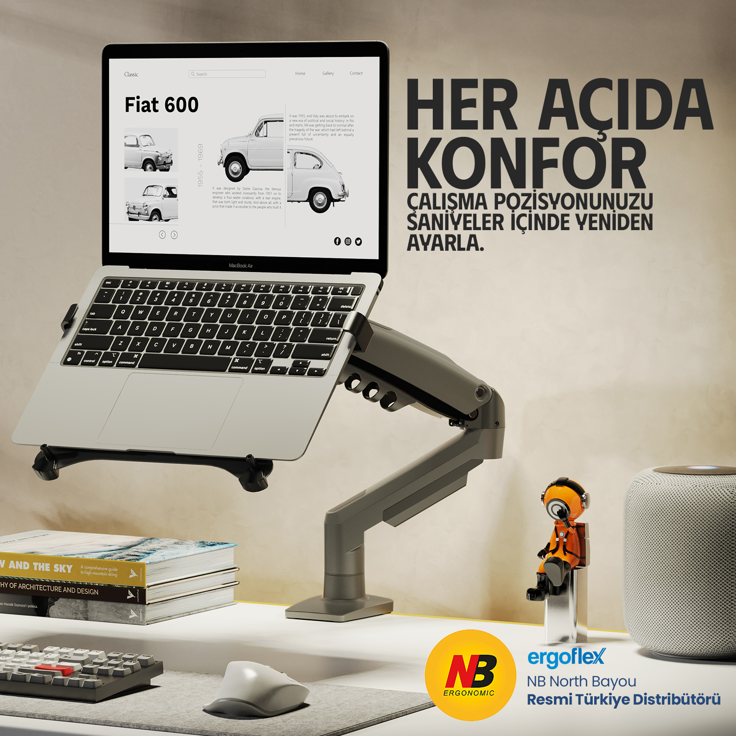 Bir dizüstü bilgisayar standı, MacBook Air, kitaplar ve klavyeyle masada.