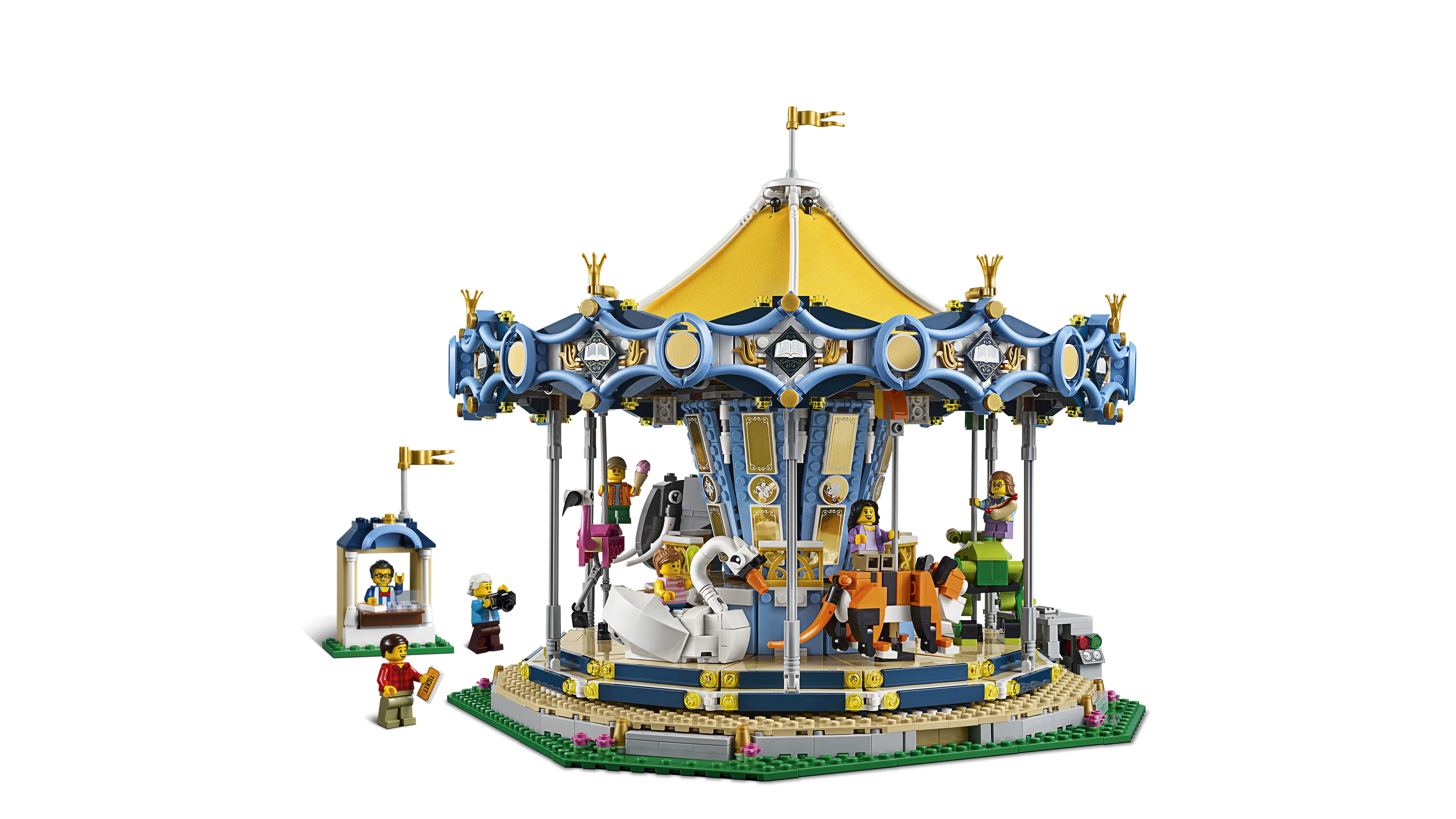 Un manège Lego avec un toit bleu et doré, des manèges d'animaux et des figurines.