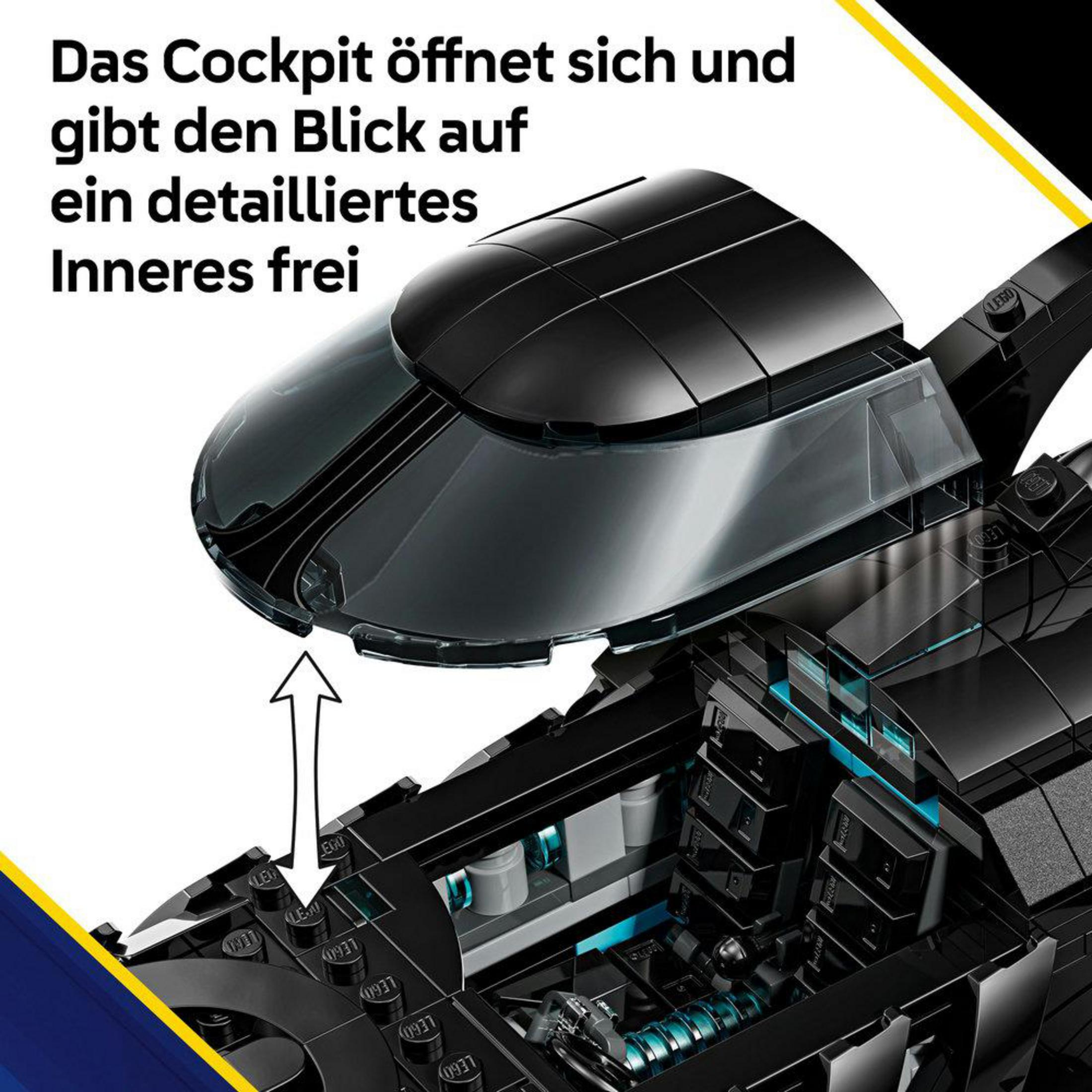 Un cockpit Lego nero si apre, rivelando un interno dettagliato con luci blu.