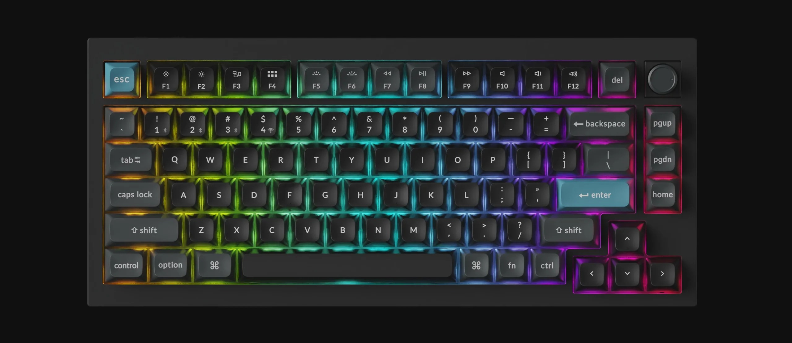 Czarna klawiatura z podświetlanymi klawiszami RGB na ciemnym tle.
