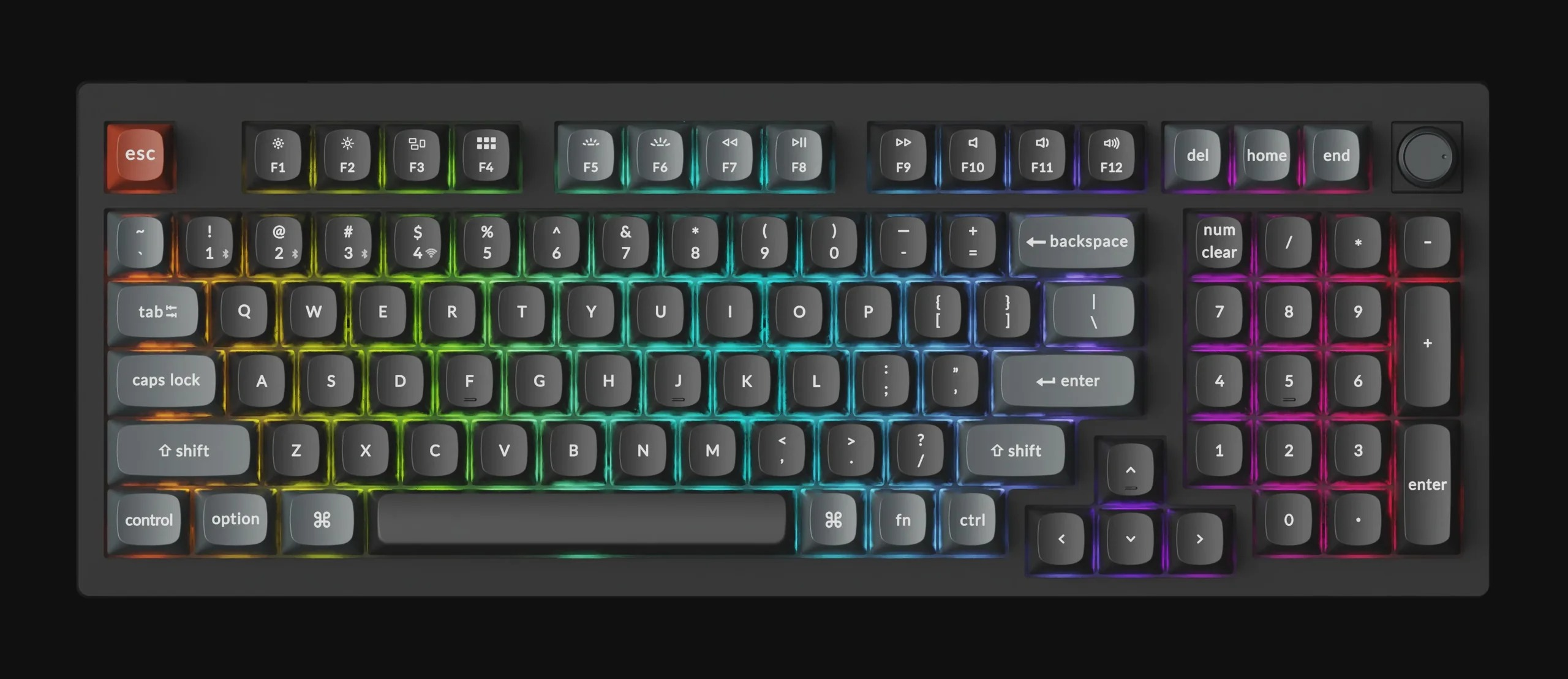 Ciemna klawiatura z kolorowymi klawiszami RGB świecącymi od lewej do prawej.