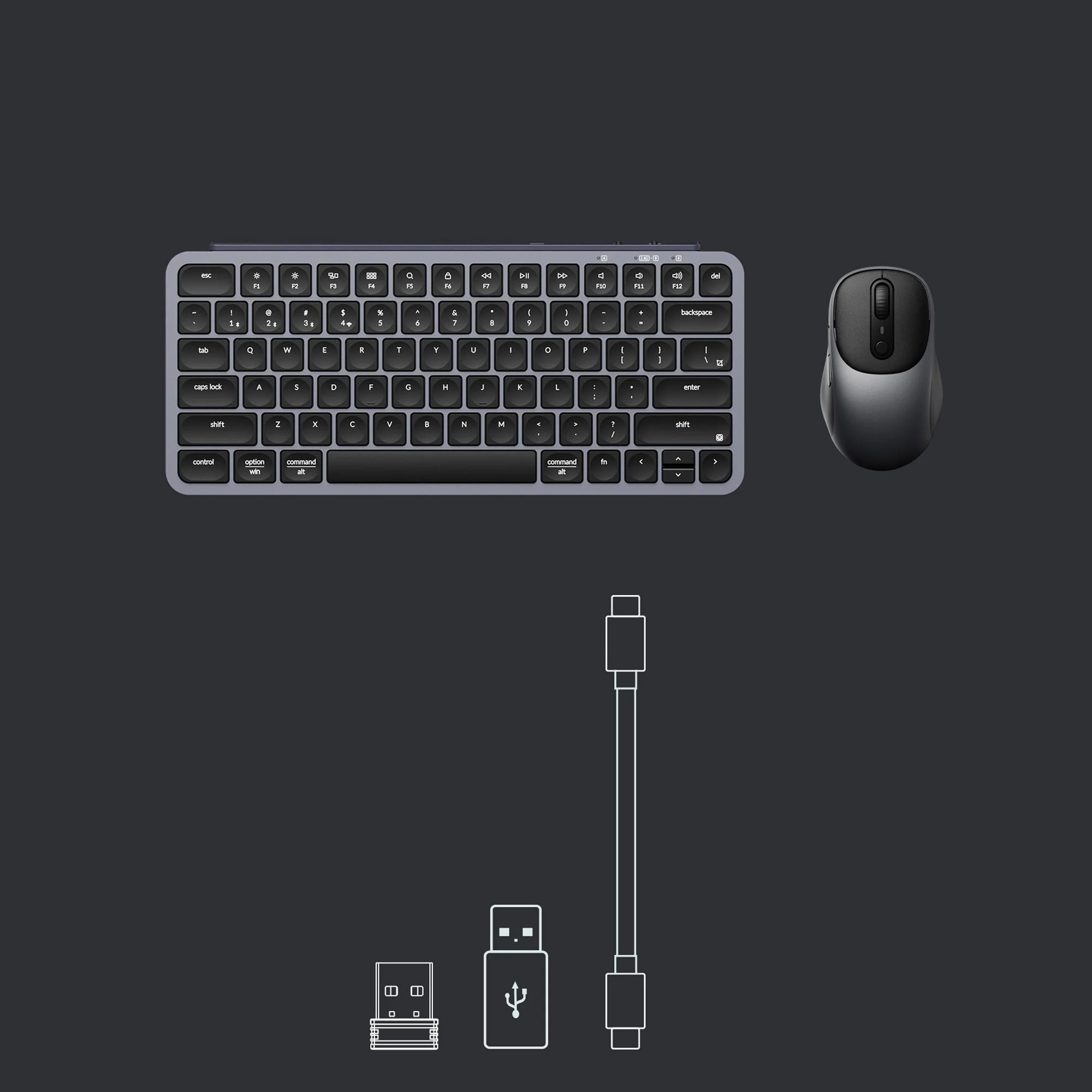 Szara bezprzewodowa klawiatura i mysz, z odbiornikiem USB i kablem na ciemnym tle.