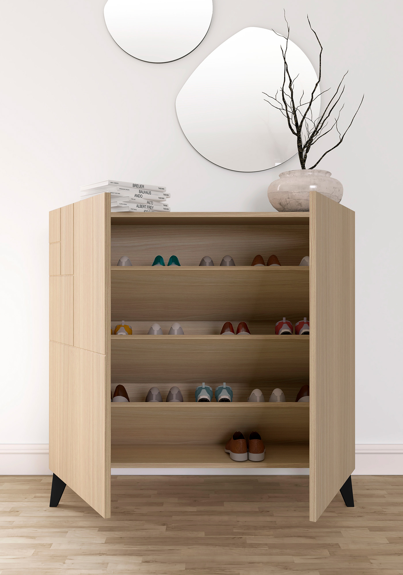 Un zapatero de madera clara con estantes llenos de zapatos. Libros y un jarrón con ramas encima.