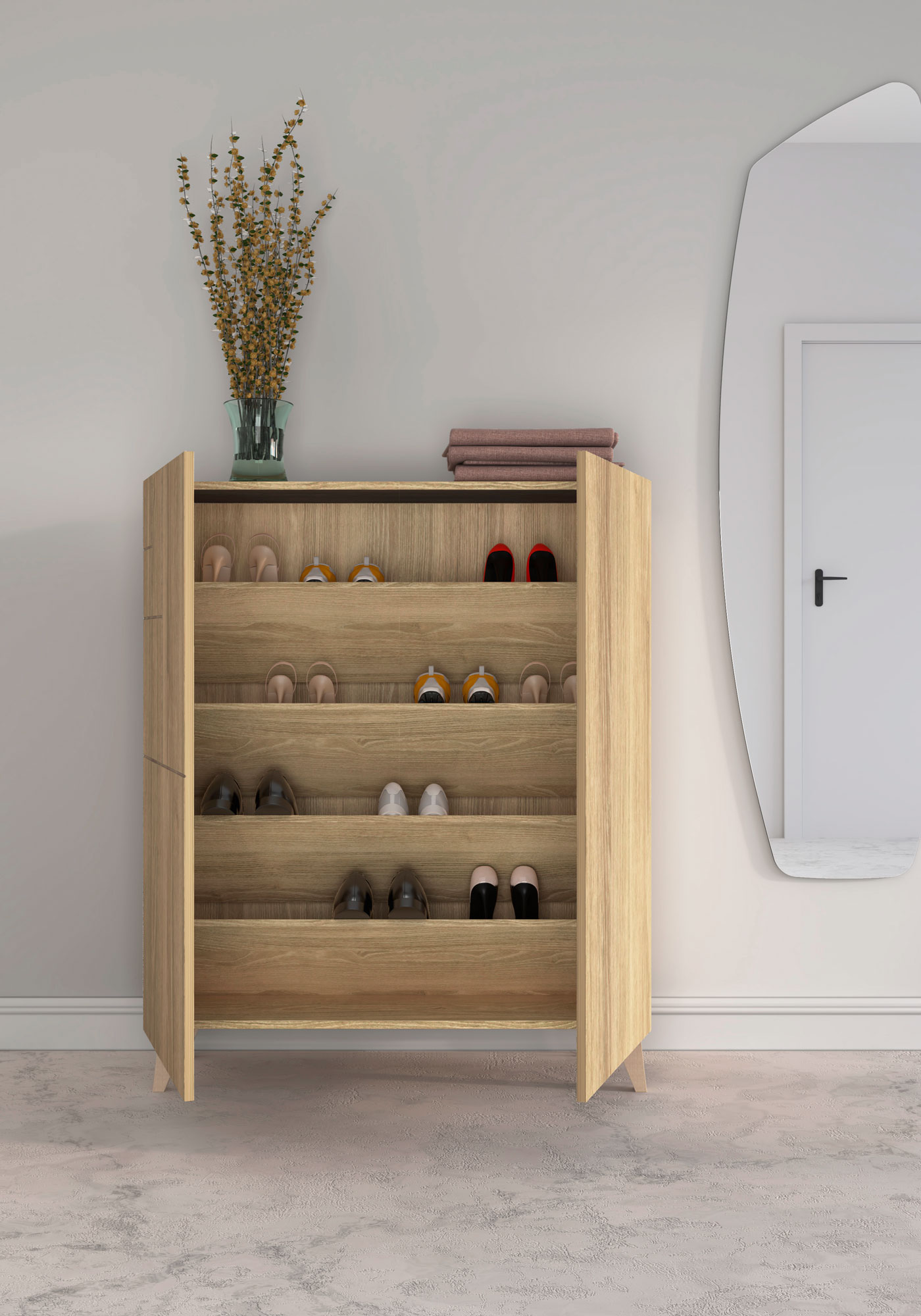 Zapatero de madera con varios zapatos, jarrón con ramas y espejo.