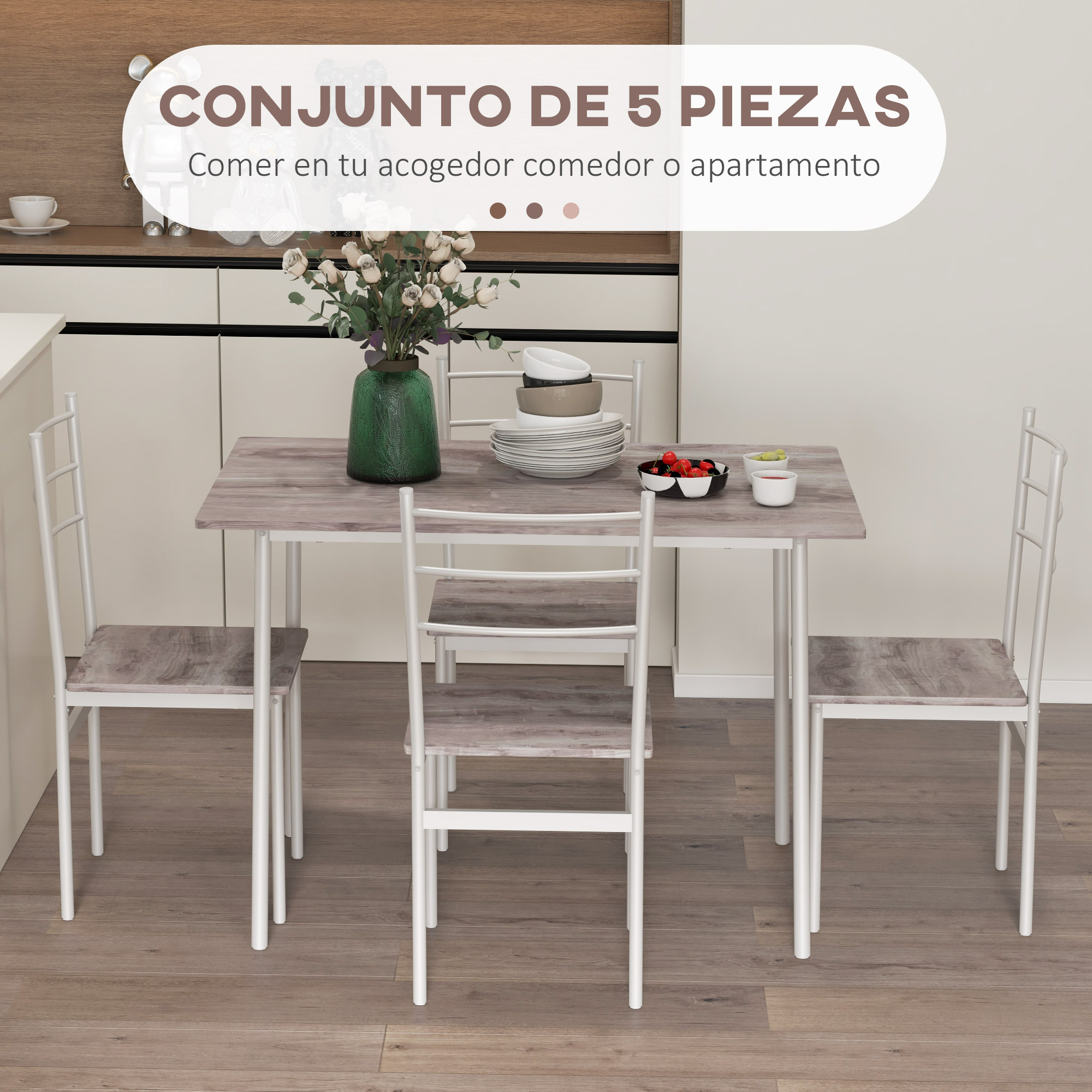 Una mesa de comedor con cuatro sillas en un comedor moderno con gabinetes de cocina al fondo.