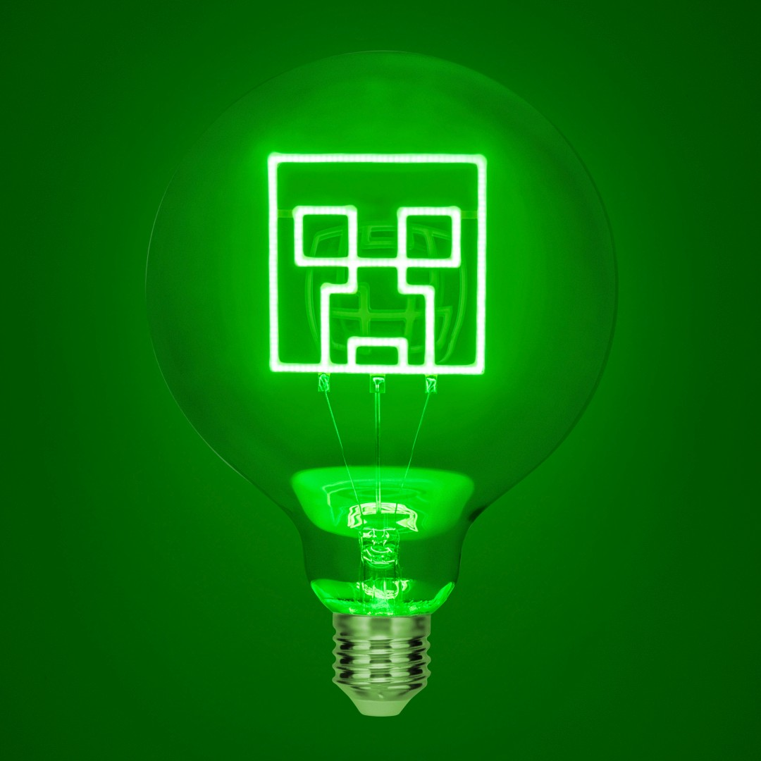 Lampadina verde con volto Creeper al neon.