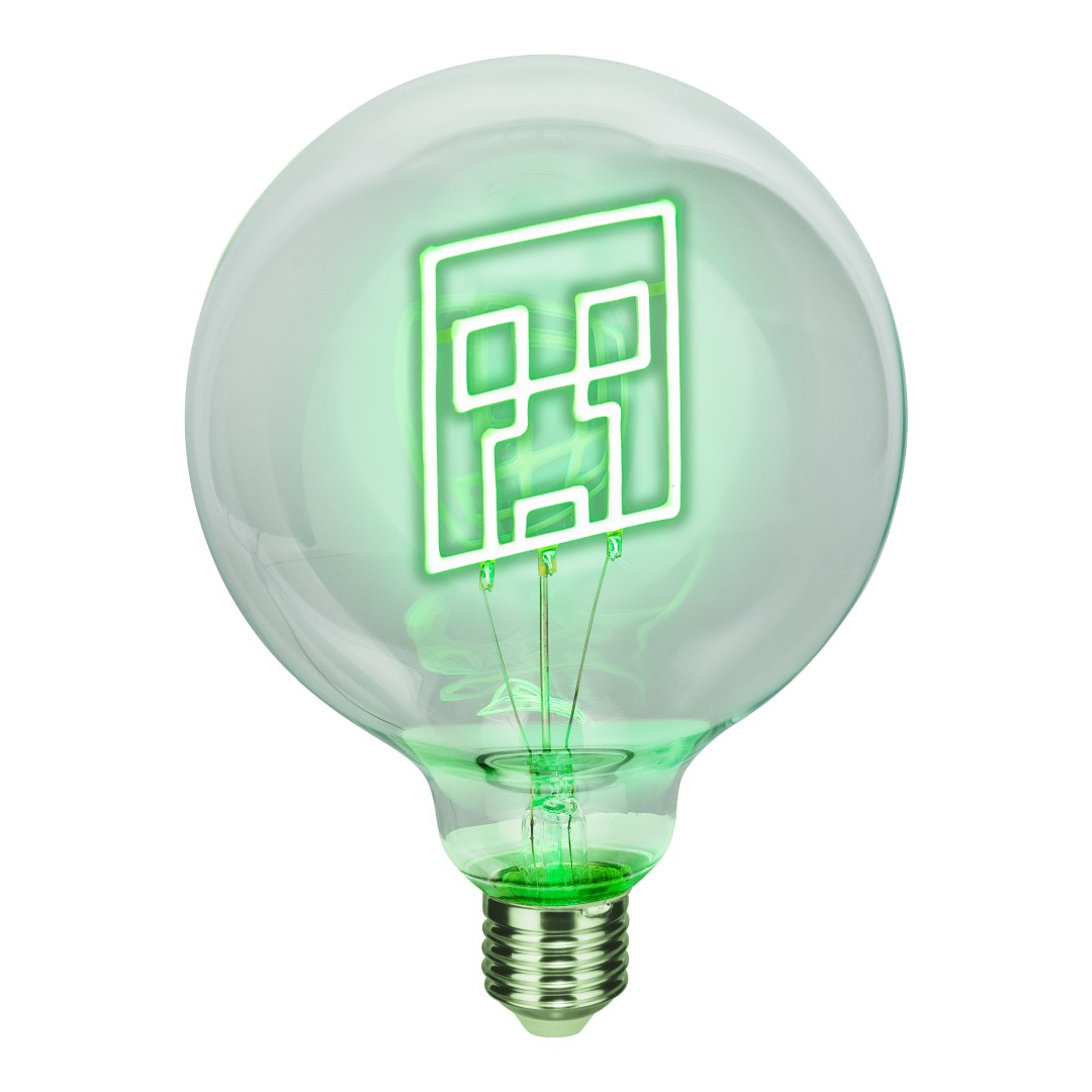 Una lampadina trasparente con un volto verde al neon di Creeper all'interno.
