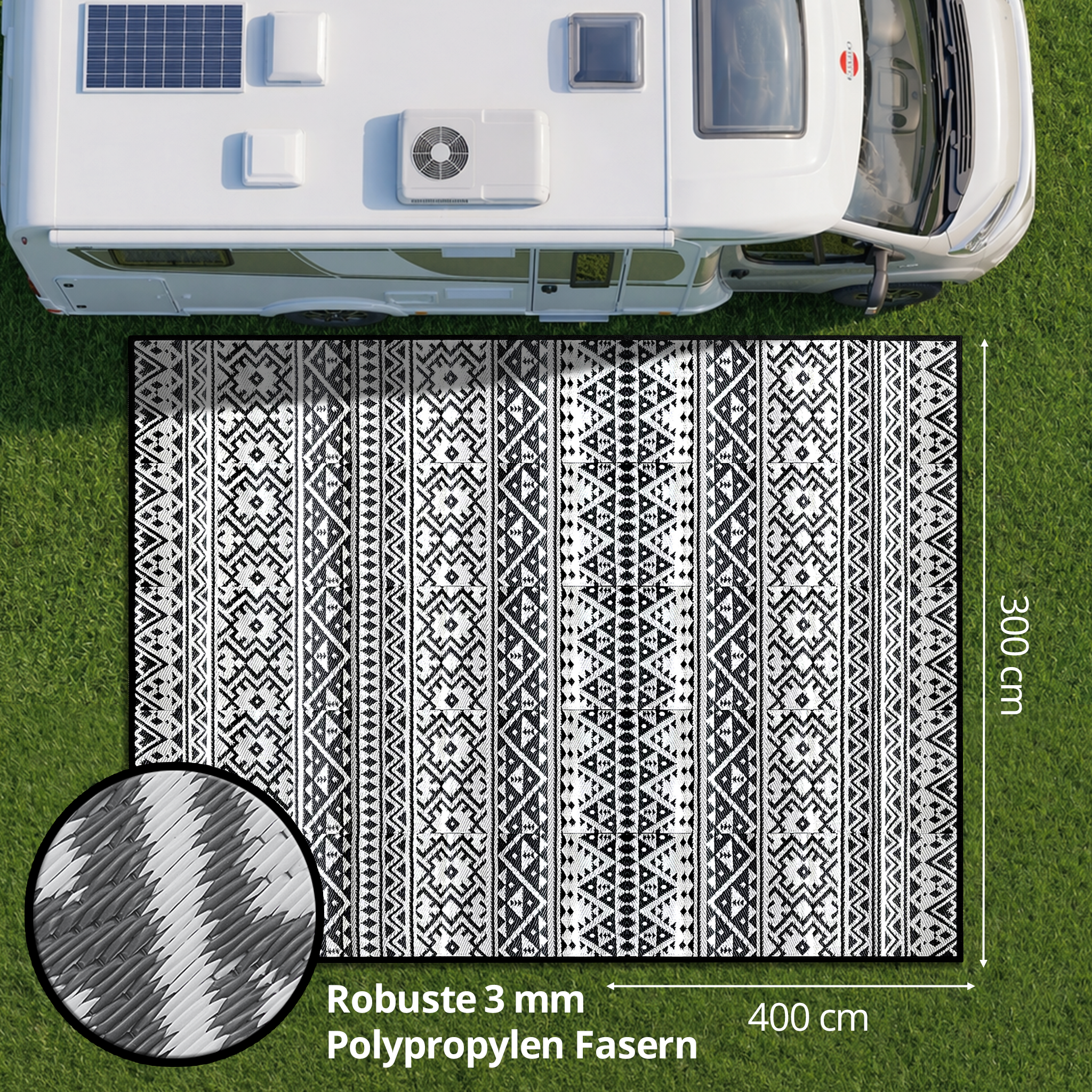 Ein Wohnmobil steht auf Rasen neben einer 400x300 cm großen Matte mit geometrischem Muster.