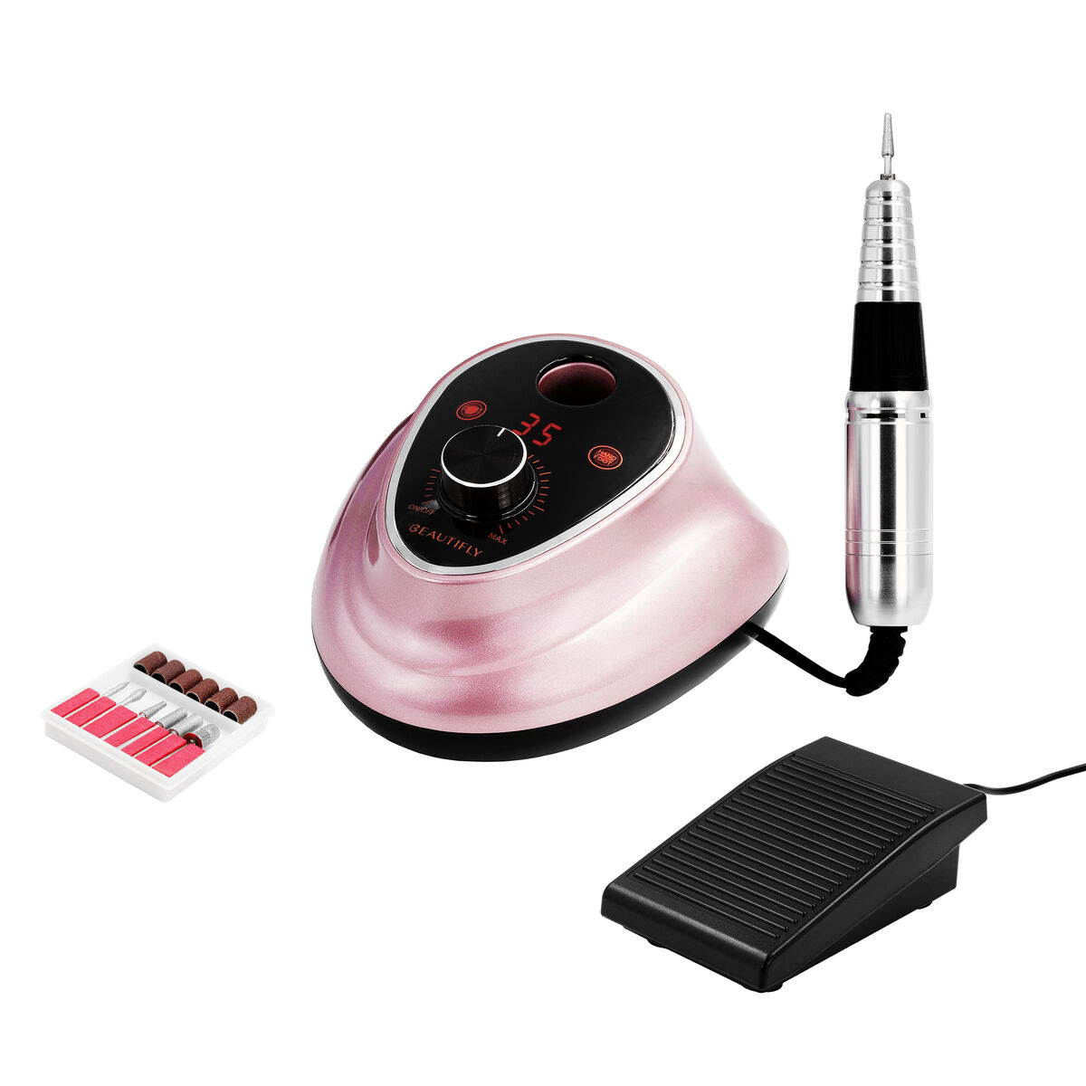 Un torno de uñas rosa con pieza de mano, pedal y brocas.