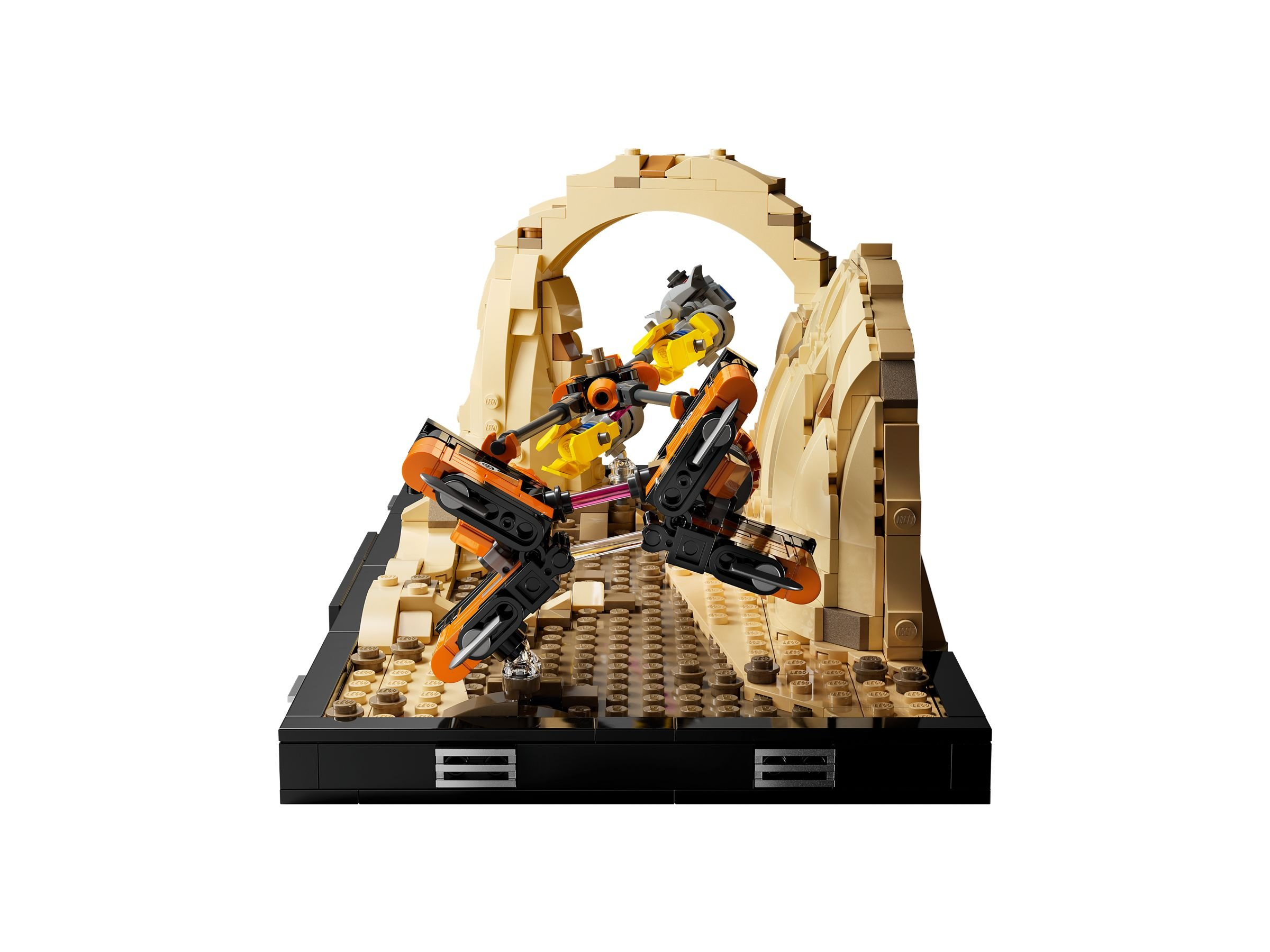 Zwei Lego-Raumschiffe kämpfen in einer Wüstenlandschaft unter einem Steinbogen.