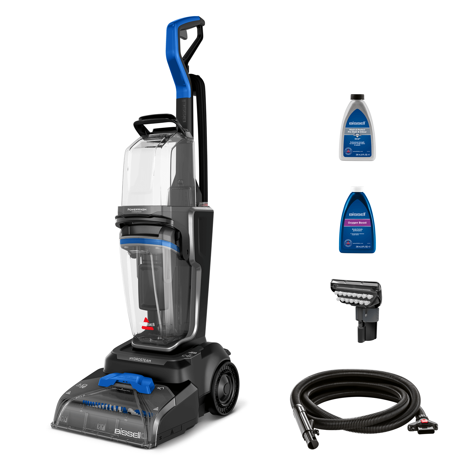 Ein Bissel PowerWash HydroSteam Teppichreiniger mit Zubehör: zwei Reinigungsmittelflaschen, eine Bürste und ein Schlauch.