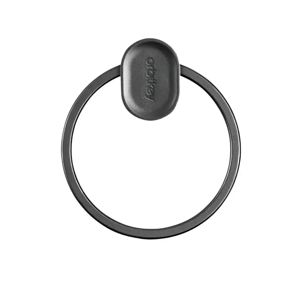 Un portasciugamani ovale scuro con anello circolare e logo 'orolley'.